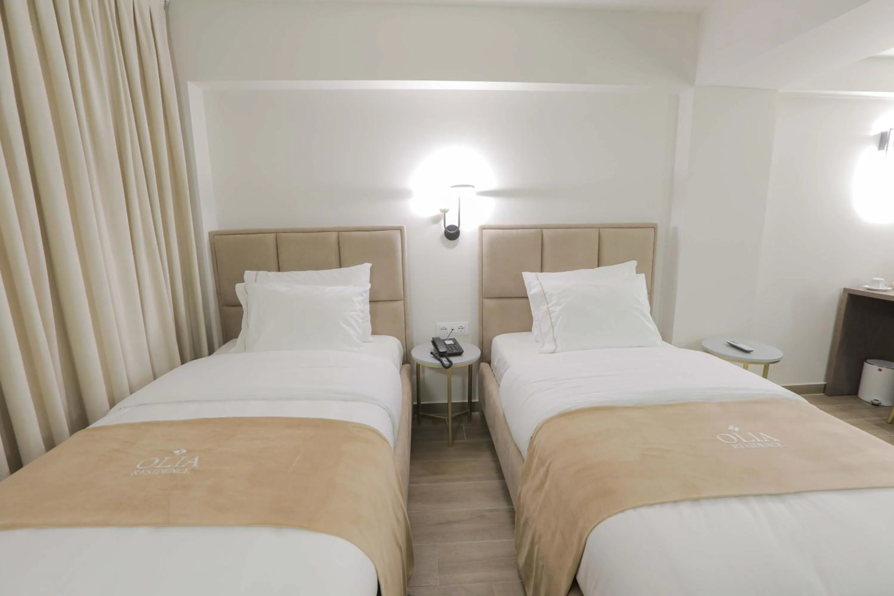 Bed in OLIA Residence