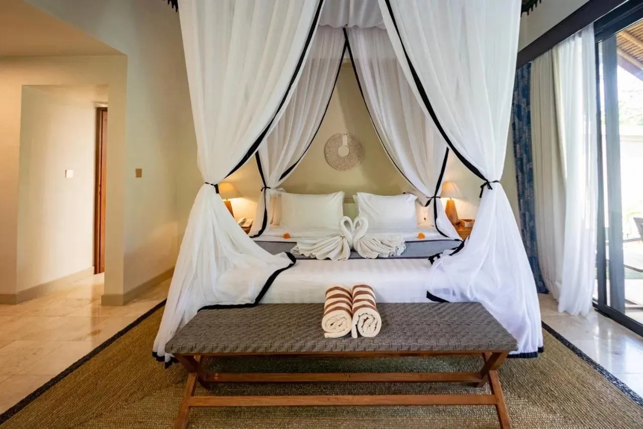 Bed in Mesari Hotel Ubud