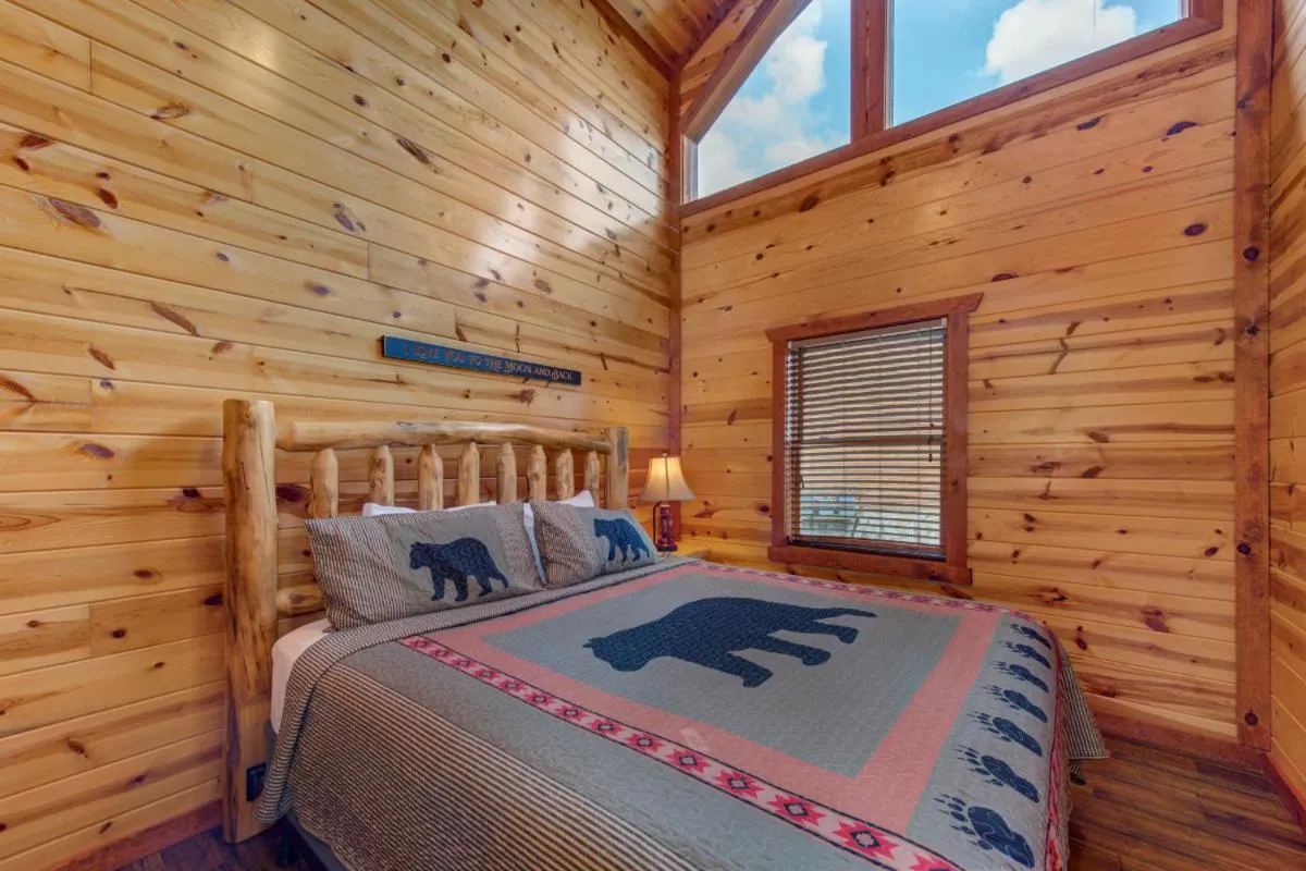 Bed in Splash Mountain Lodge By Avada Properties