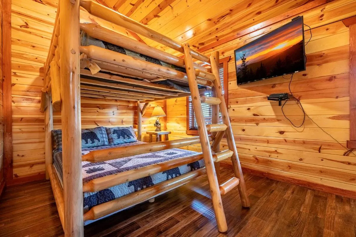 Bed in Splash Mountain Lodge By Avada Properties