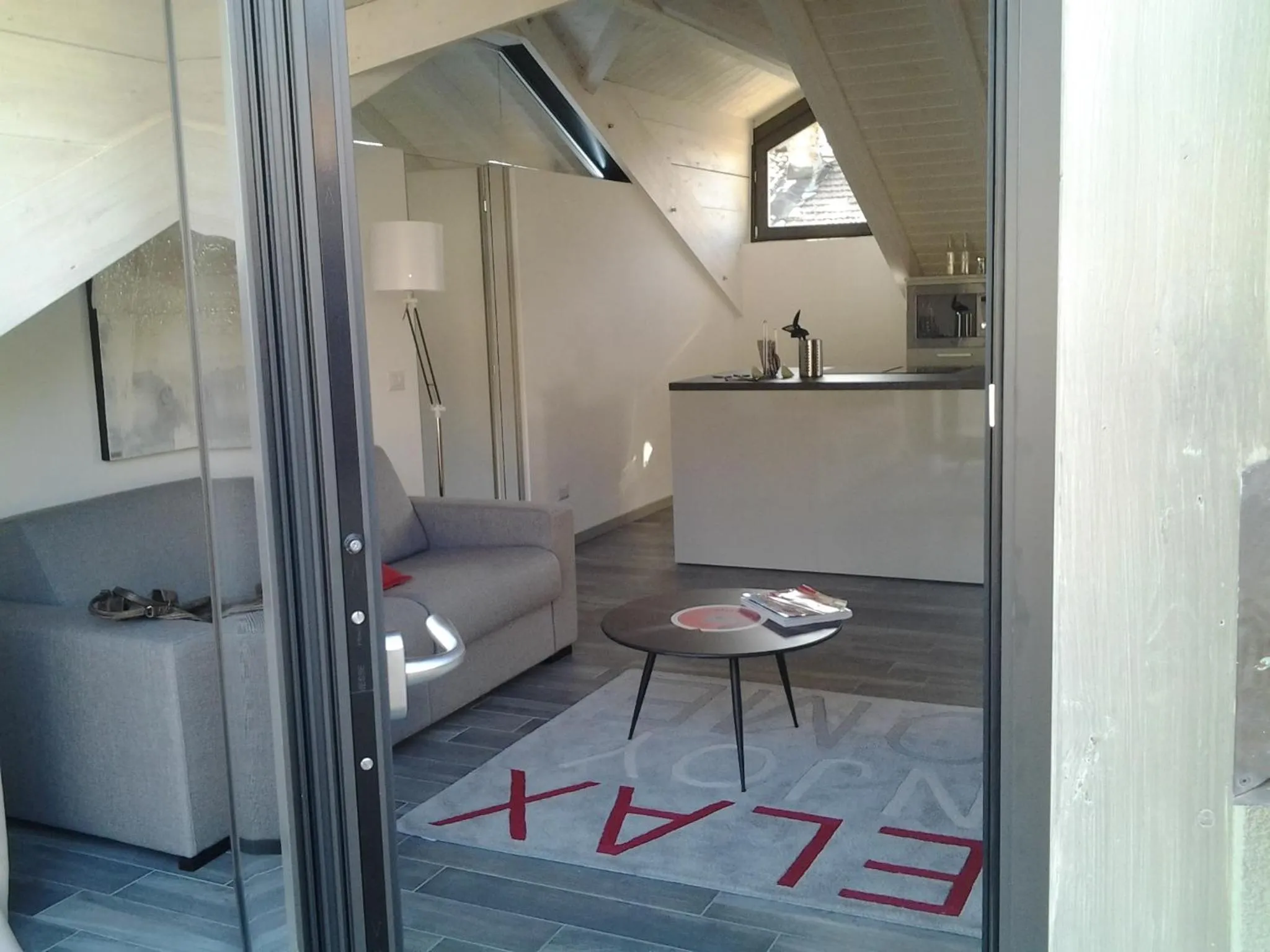 Seating area in Como Via Carcano 13
