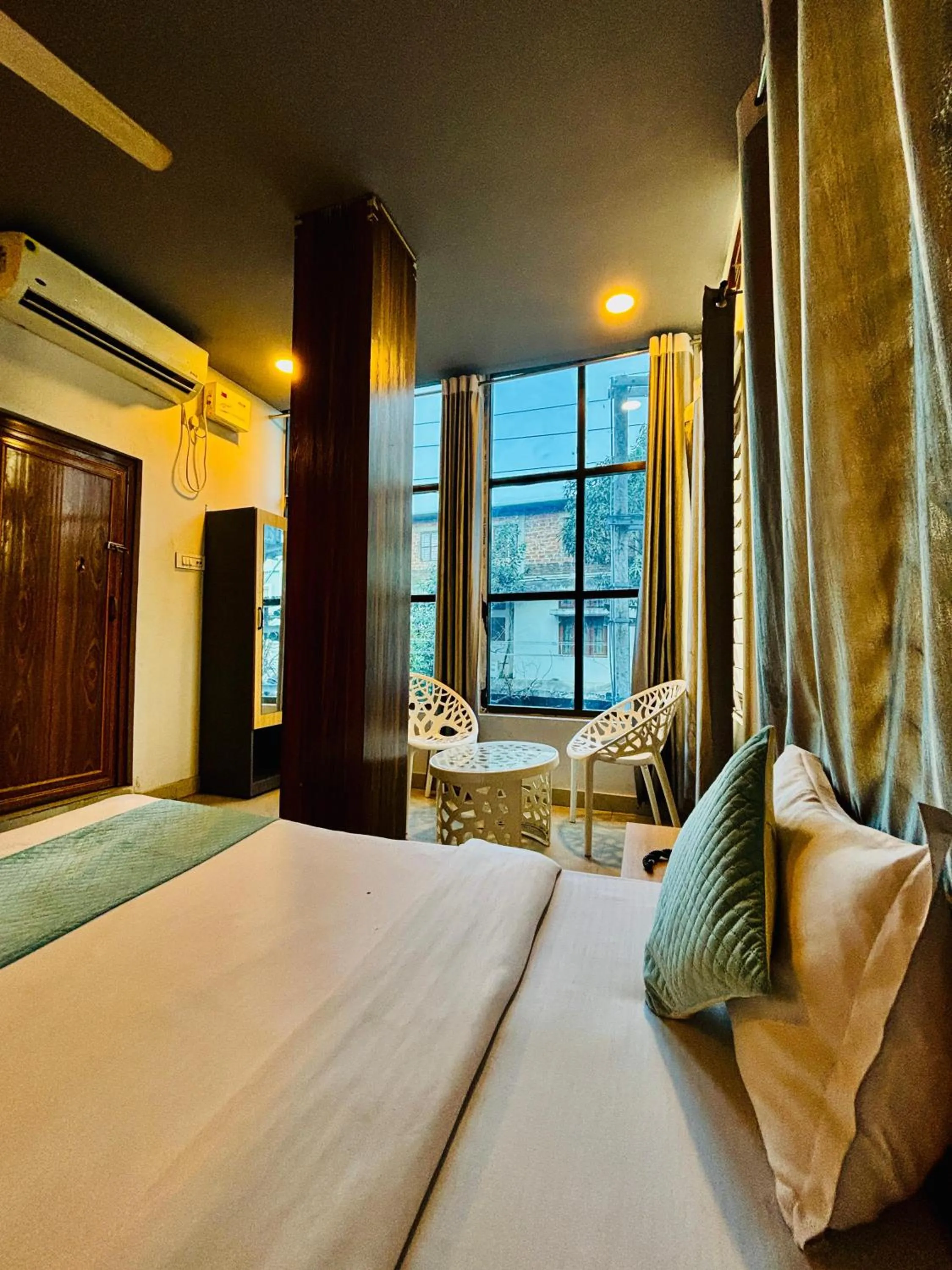 Bed in Hotel Aditya Guwahati