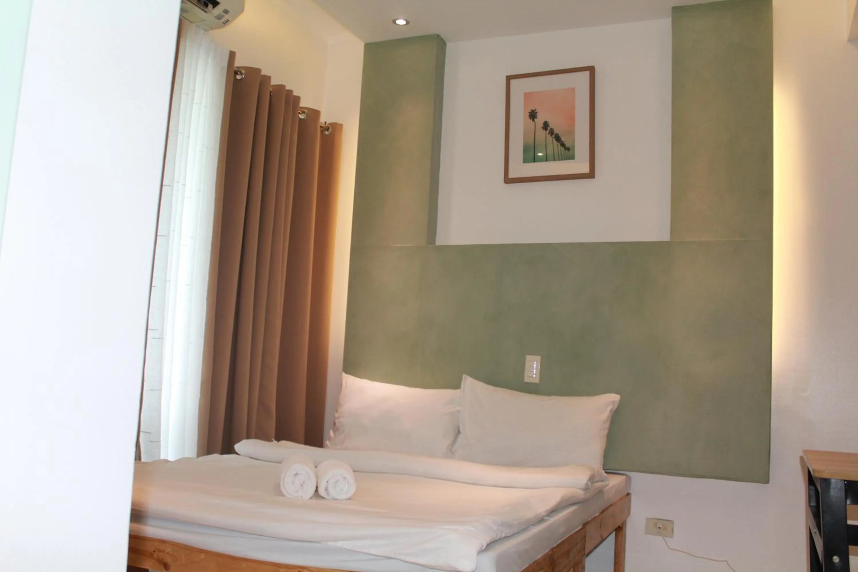 Bed in Premiere Haven MOA Staycation