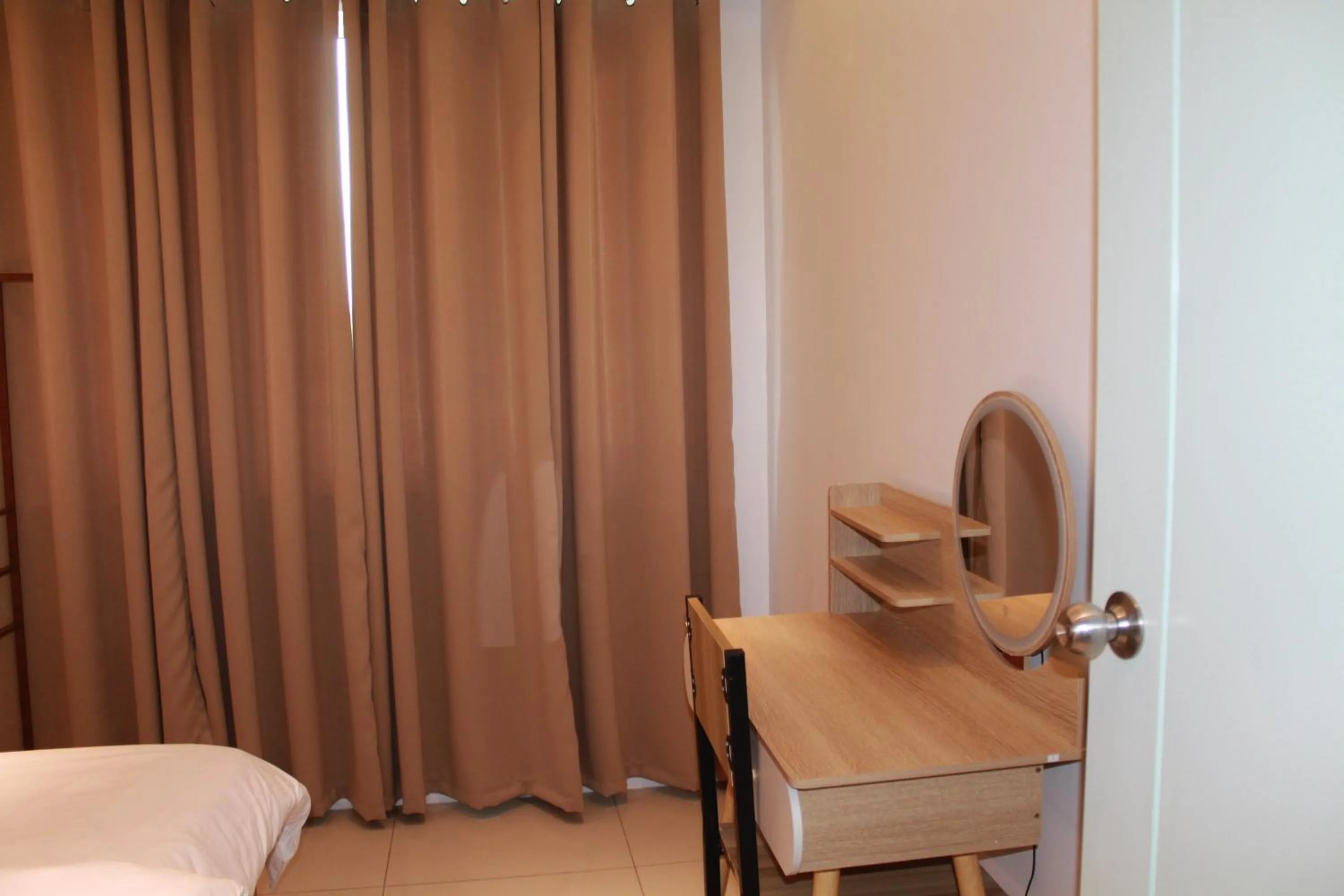 Bed in Premiere Haven MOA Staycation