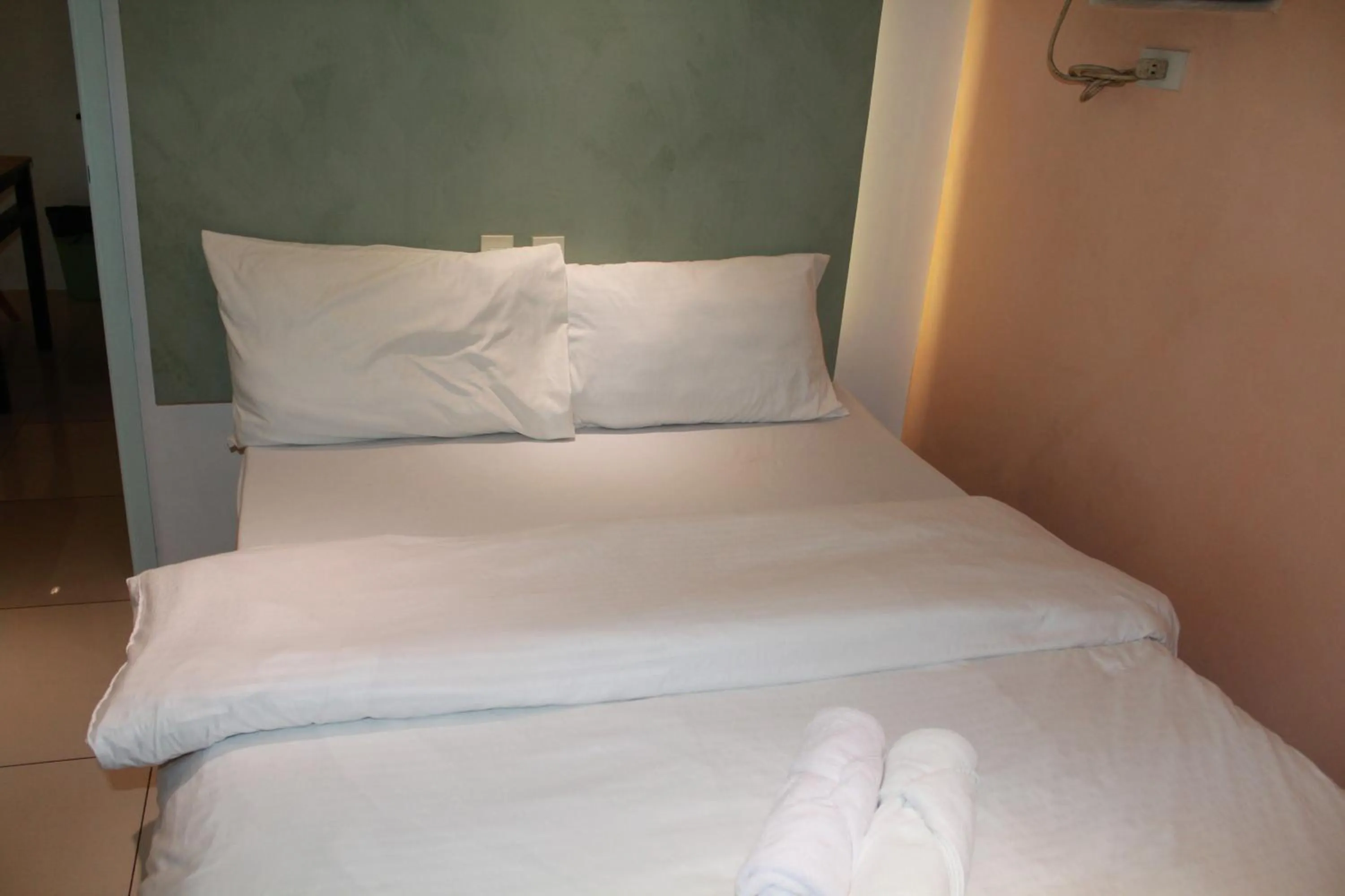 Bed in Premiere Haven MOA Staycation