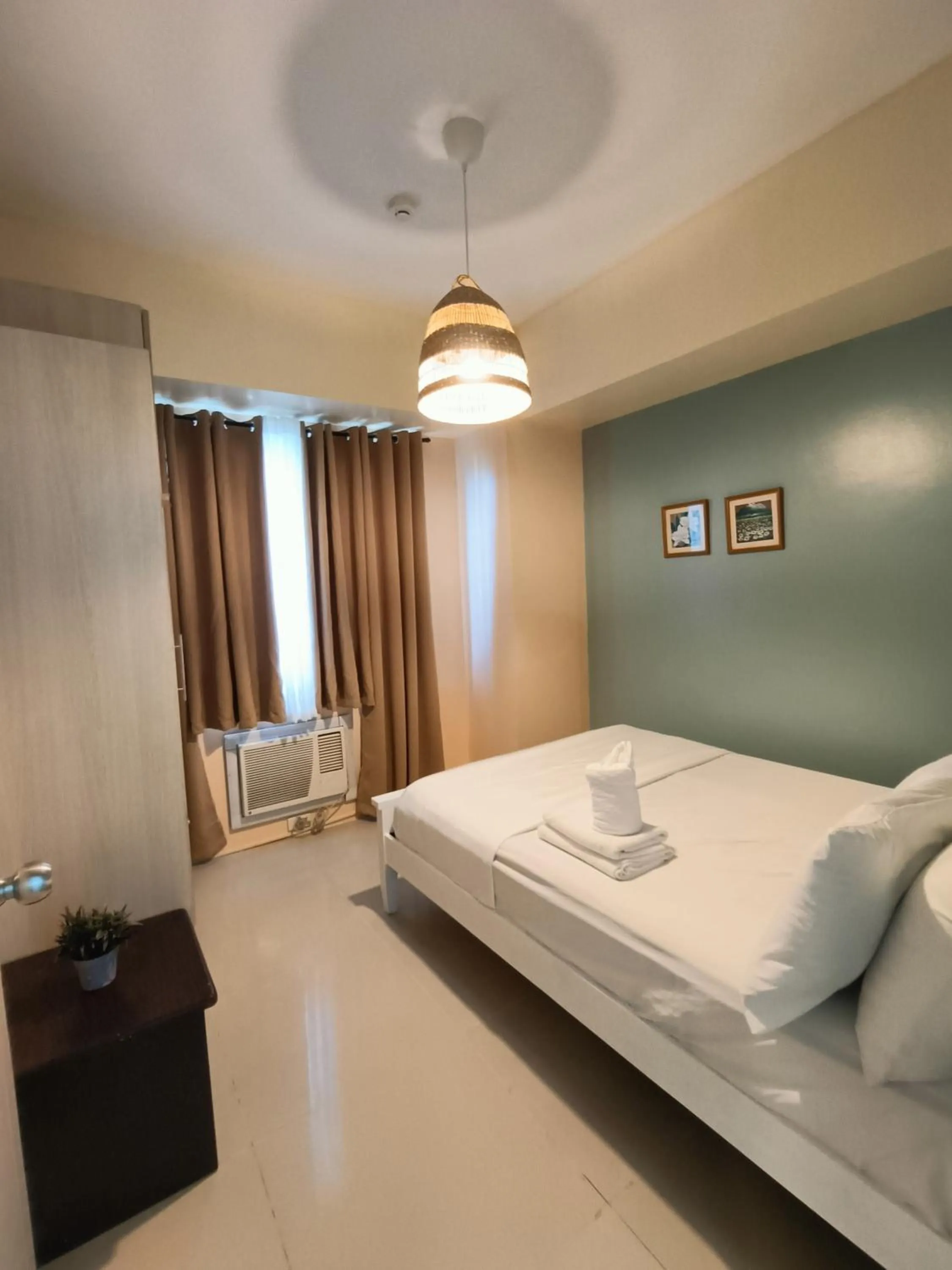 Bed in Premiere Haven MOA Staycation