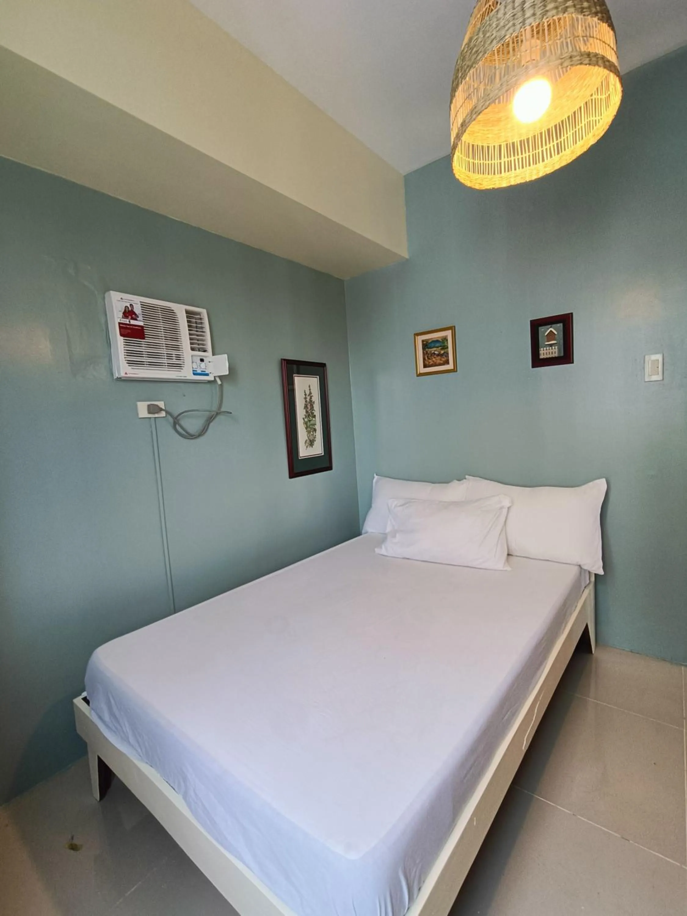 Bed in Premiere Haven MOA Staycation