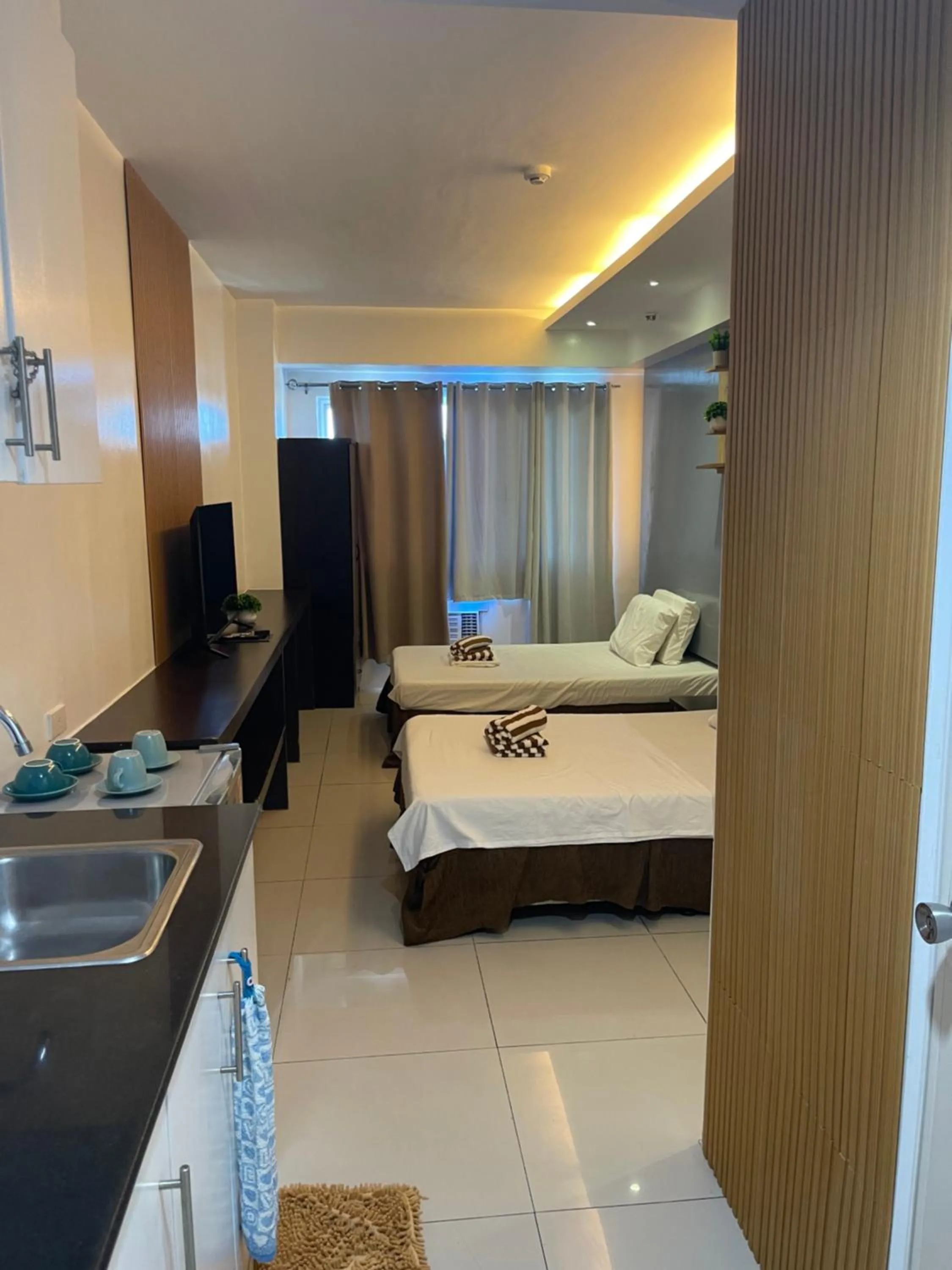 Bed in Premiere Haven MOA Staycation