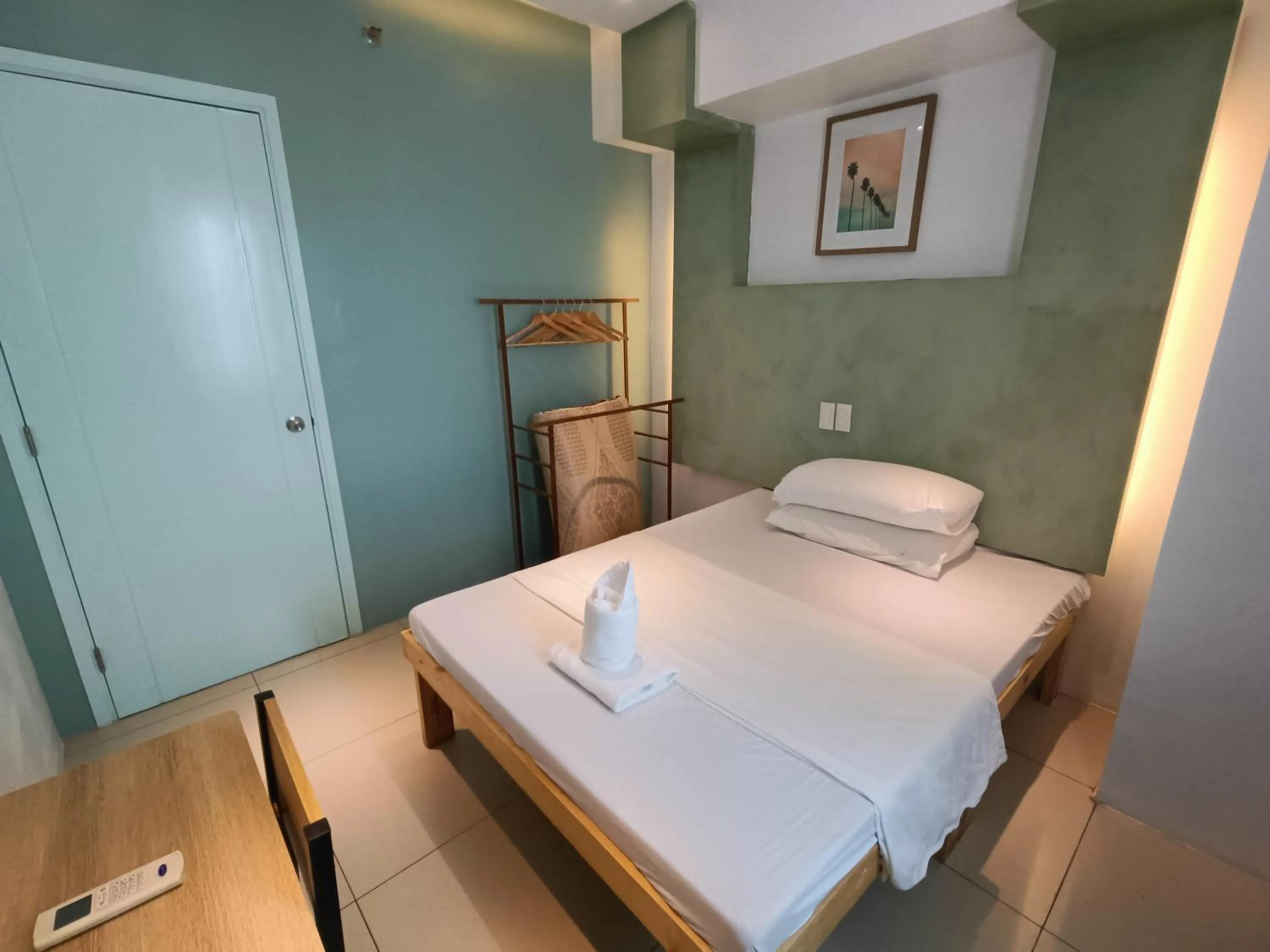 Bed in Premiere Haven MOA Staycation