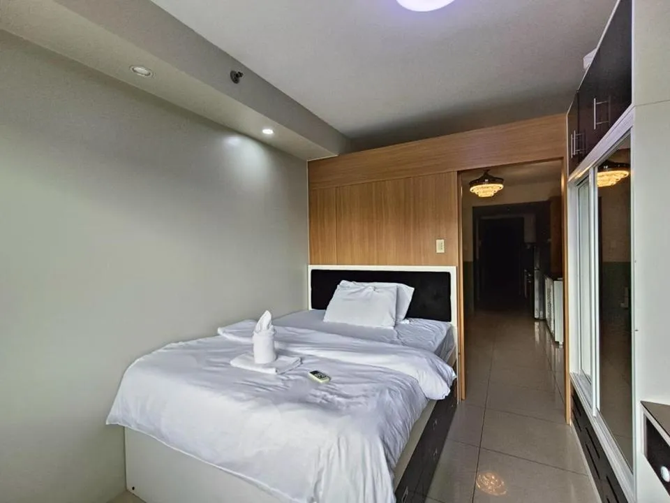 Bed in Premiere Haven MOA Staycation