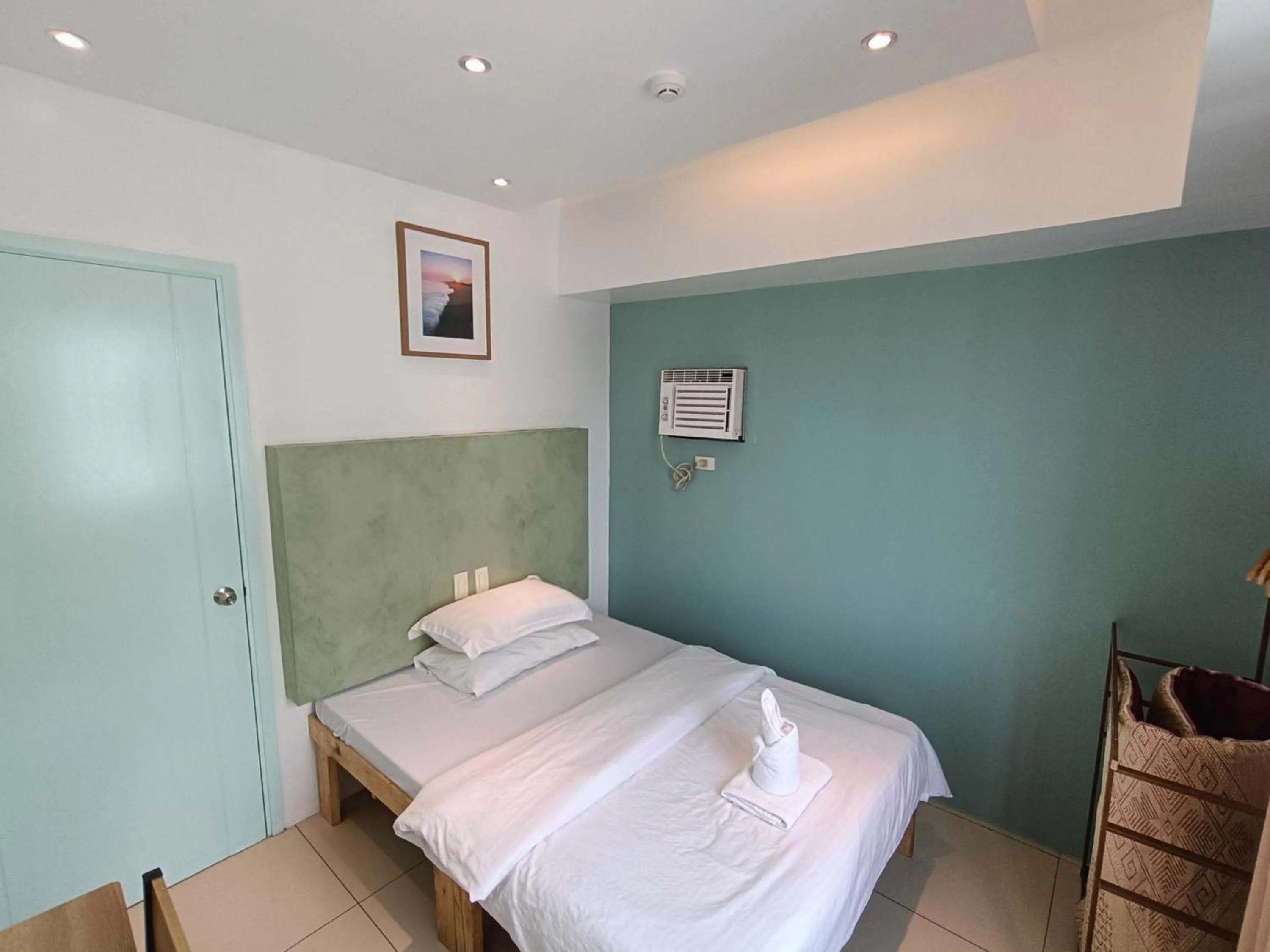 Bed in Premiere Haven MOA Staycation