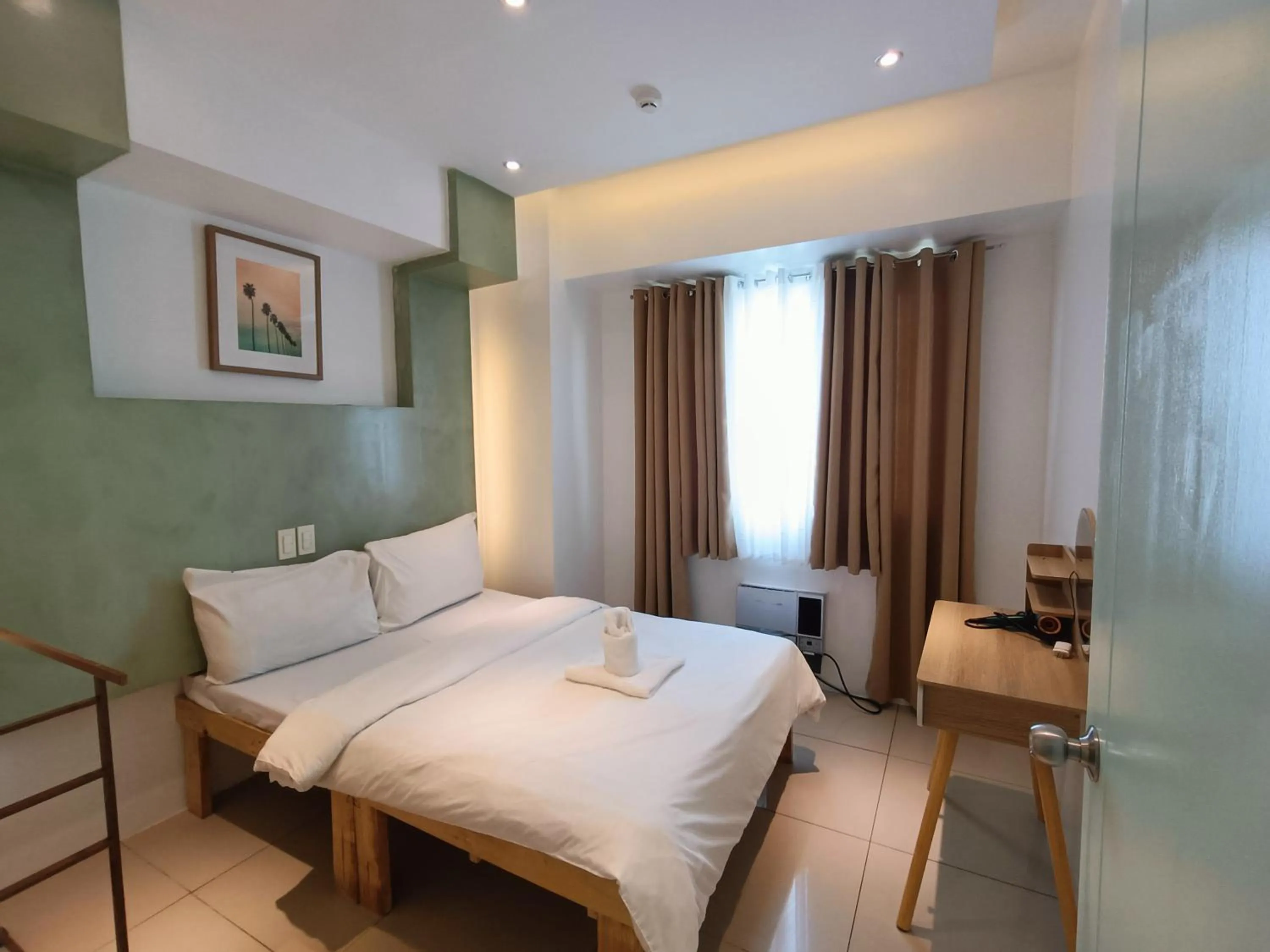 Bed in Premiere Haven MOA Staycation