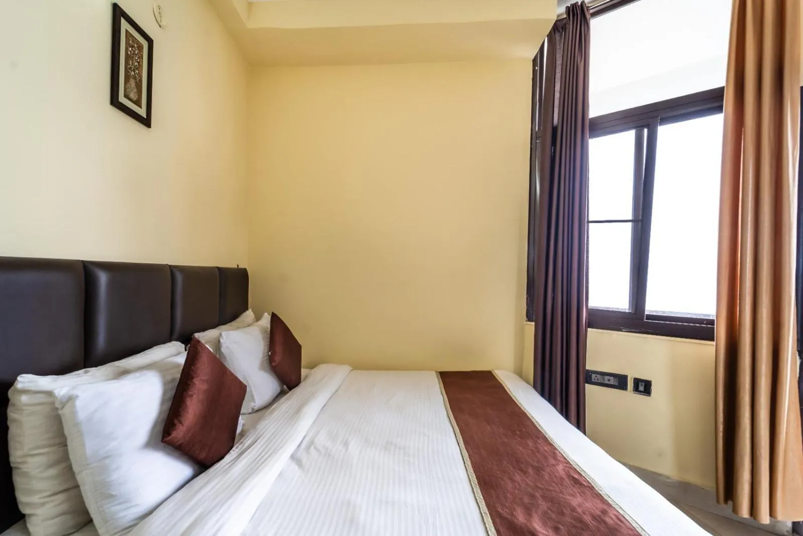 Bed in Flutter Hotels & Resort