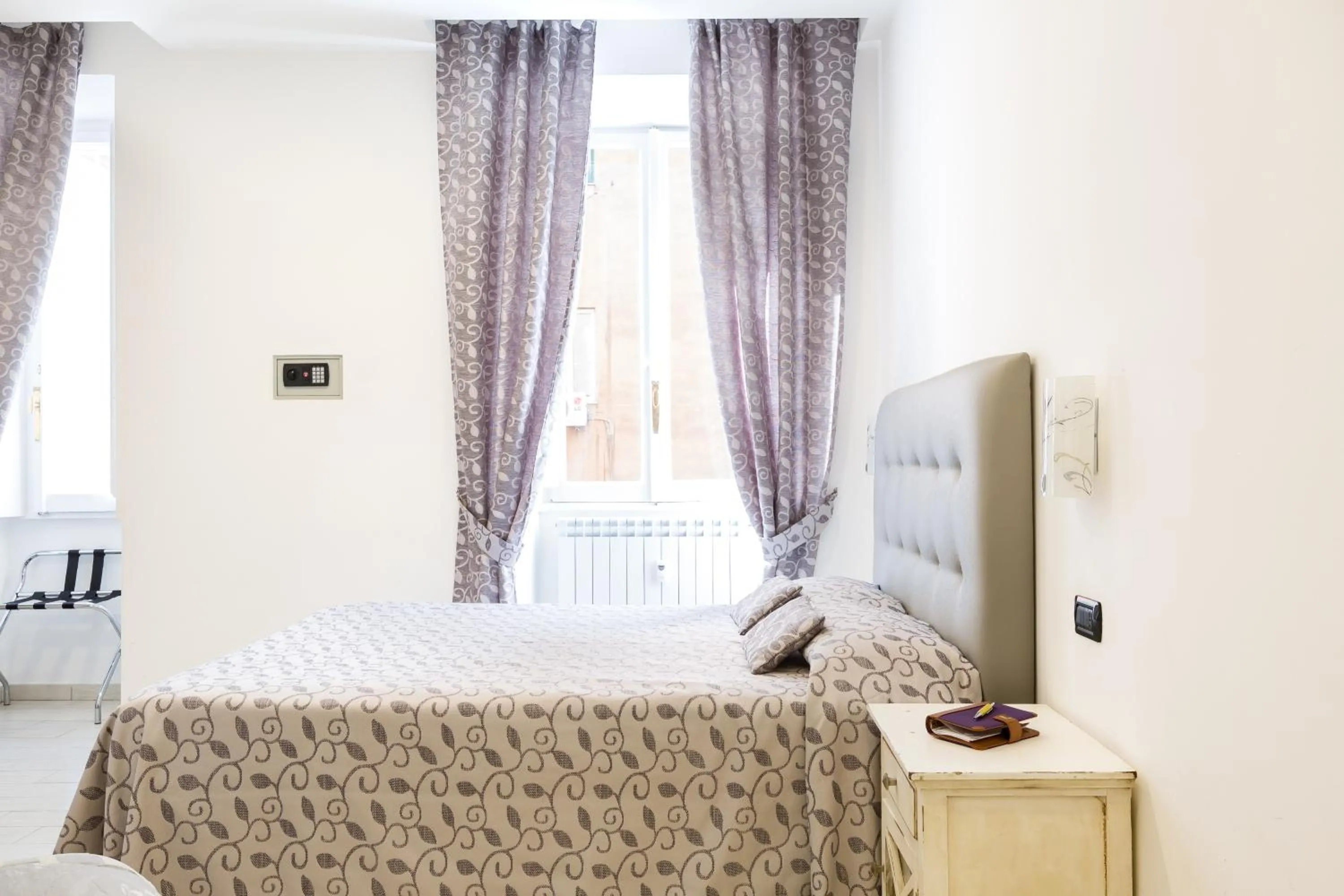 Bed in Relais Calamatta