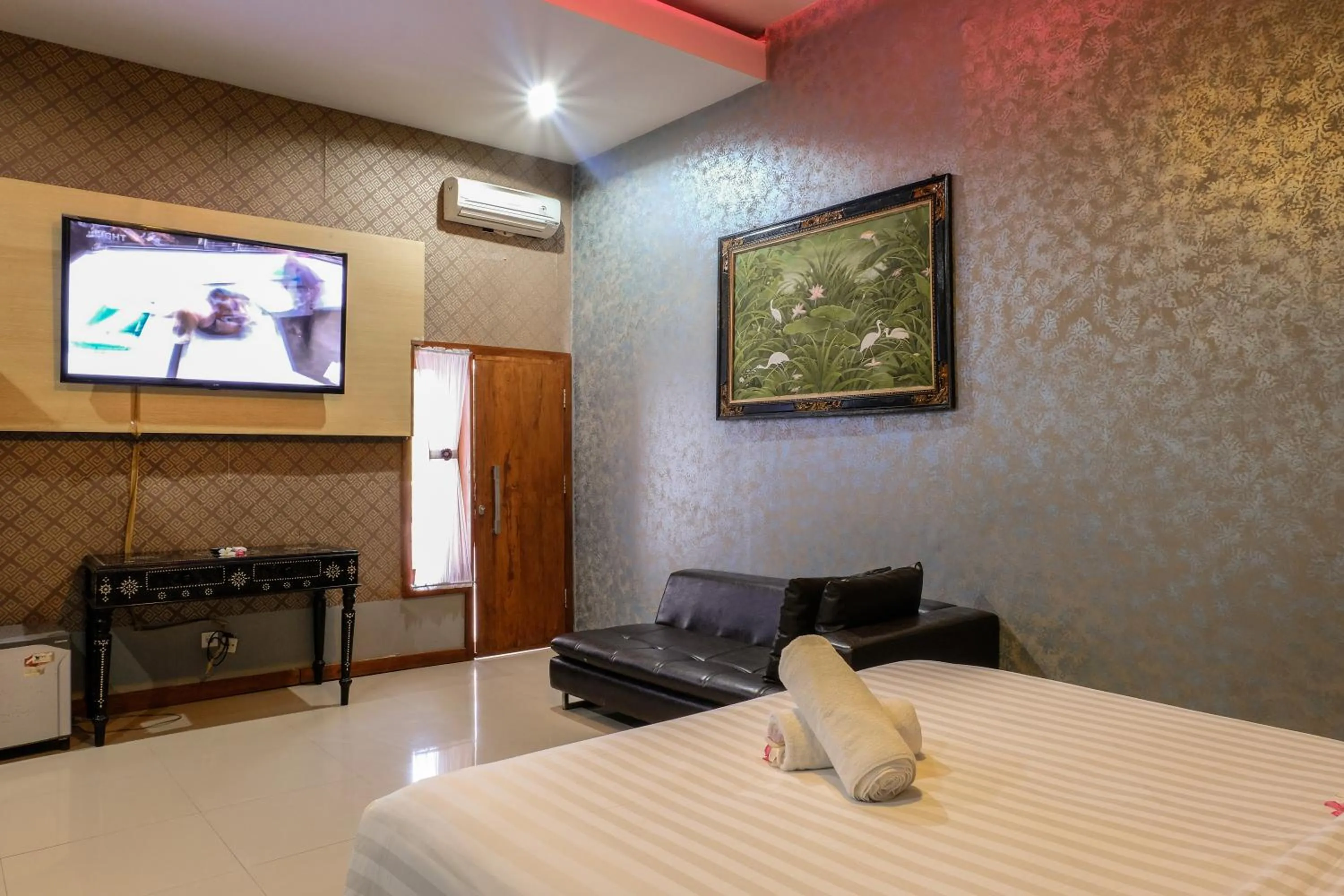 Bed in JM Hotel Kuta Lombok