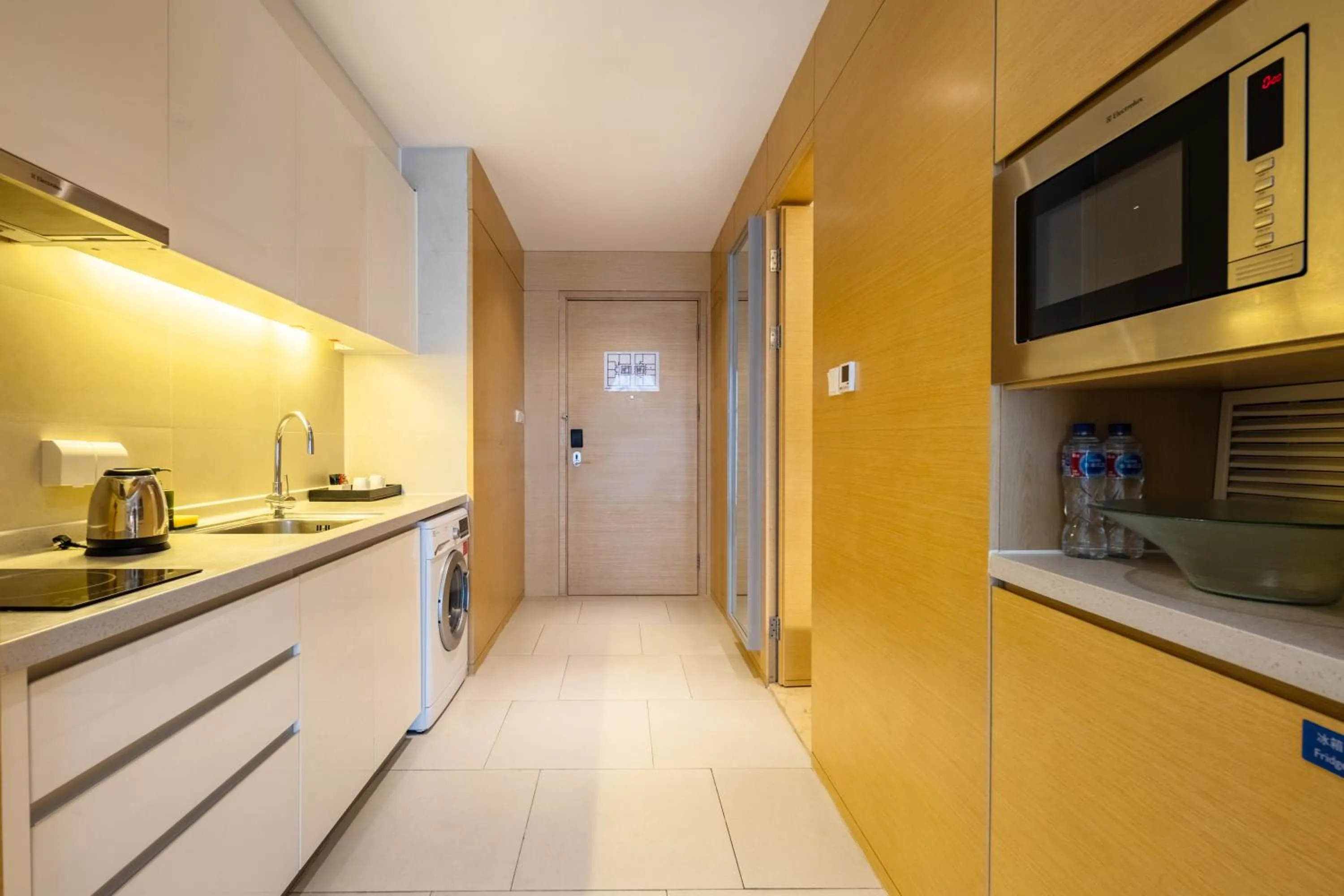 Kitchen or kitchenette in CM Service Apartment Tianjin
