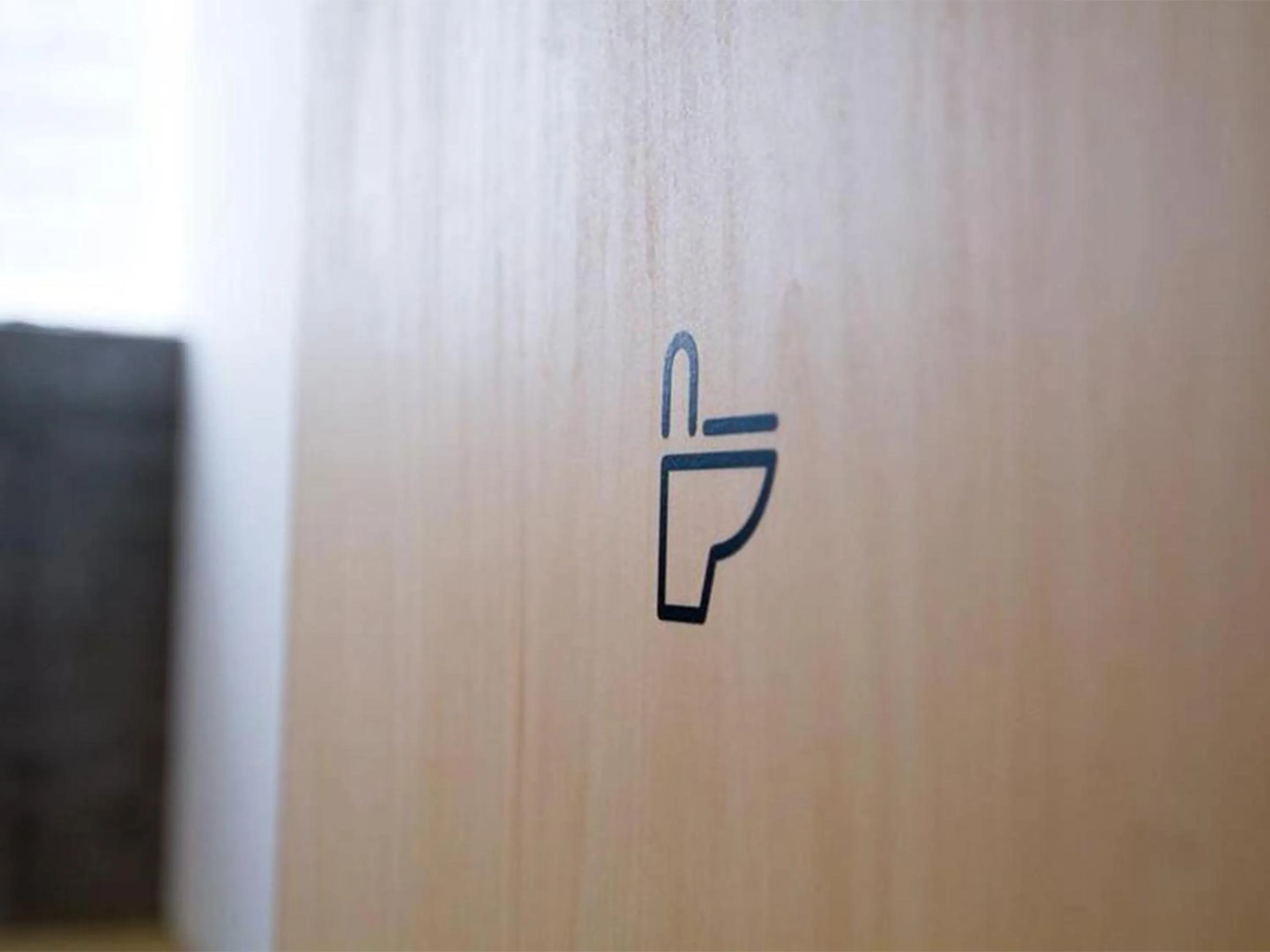 Toilet in Hostel TangaTable