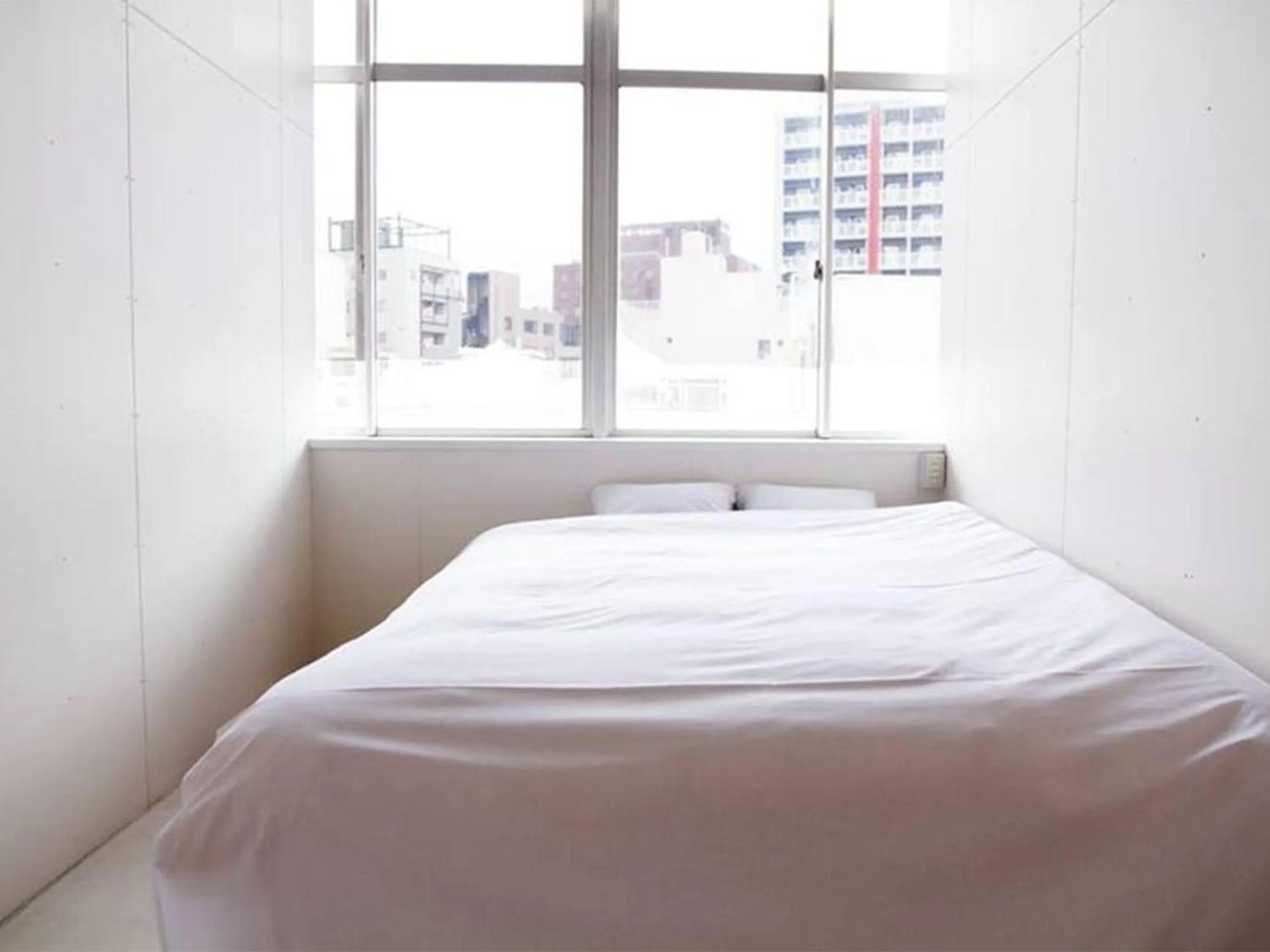 Photo of the whole room, Bed in Hostel TangaTable