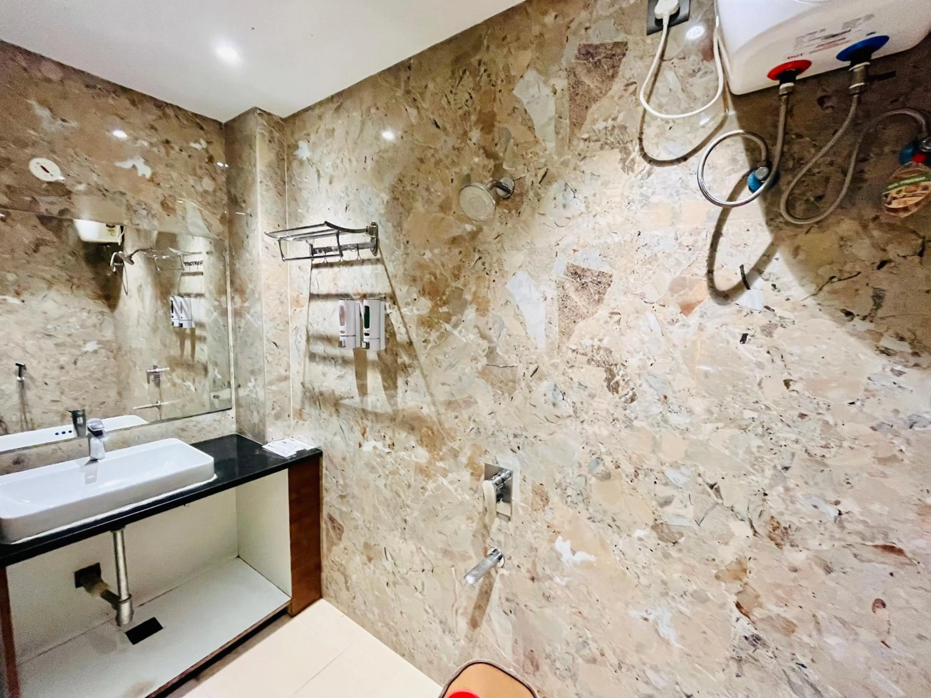 Shower in Shankar Bhavan By Vinayak Hotels