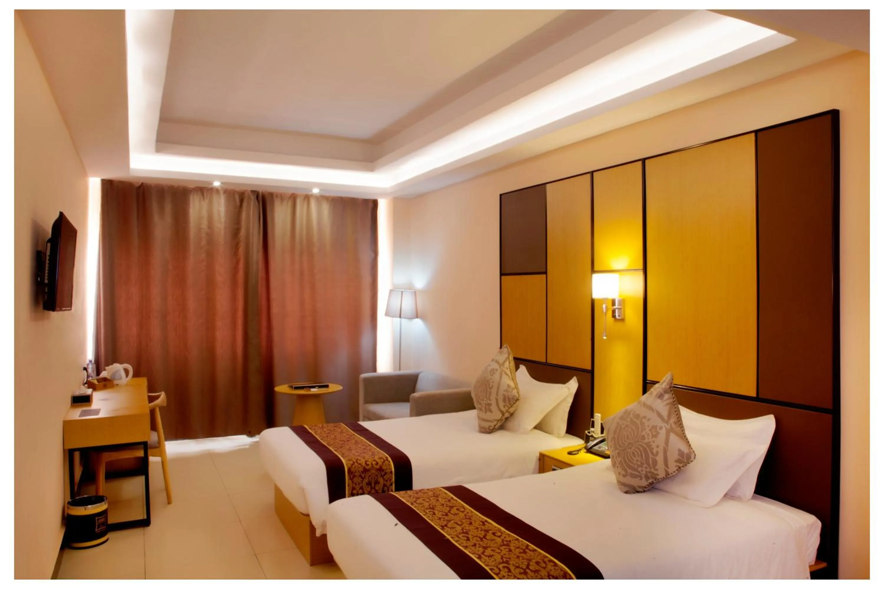 Bed in 2000 Hotel Downtown Kigali