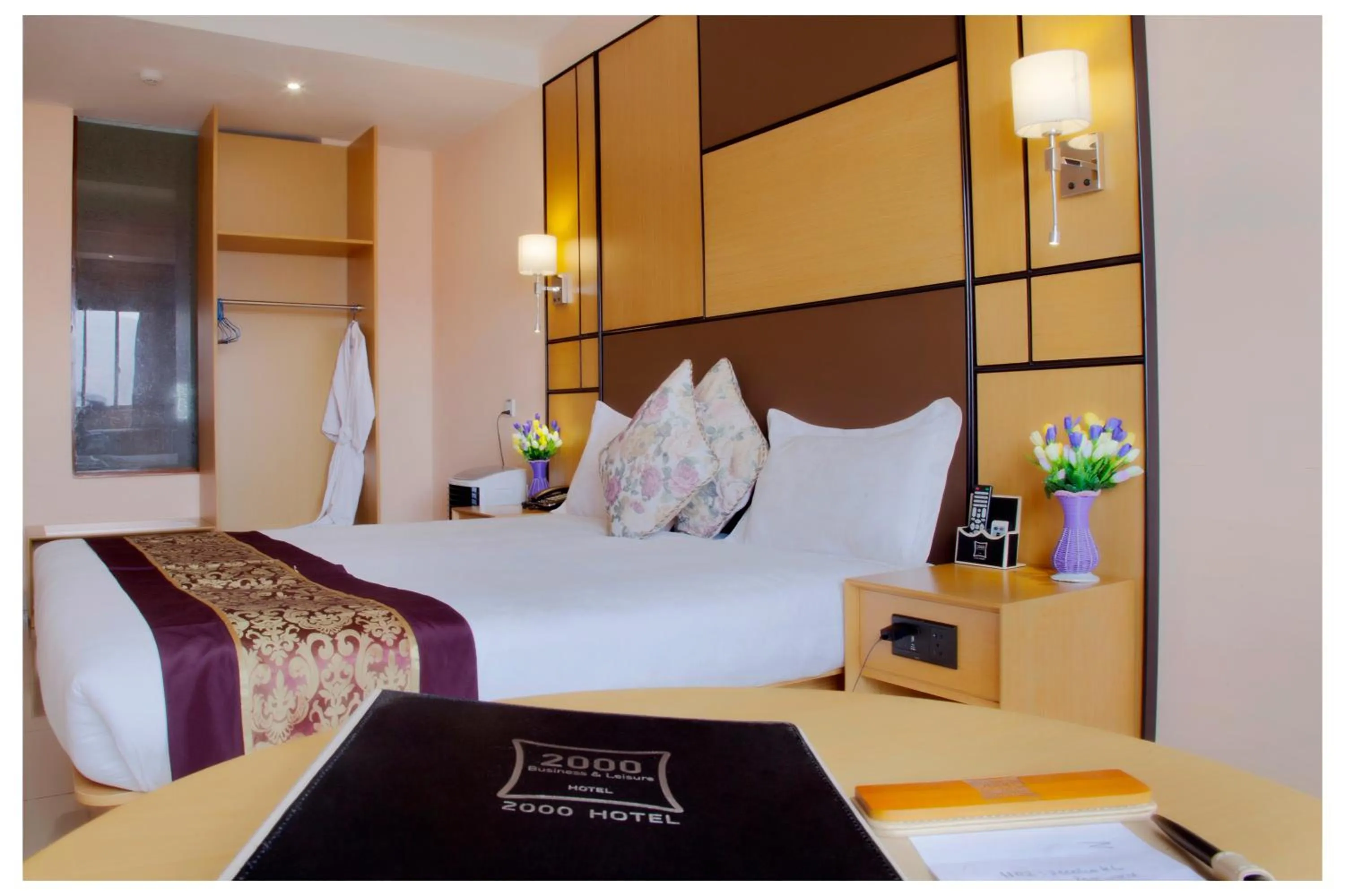 Bed in 2000 Hotel Downtown Kigali