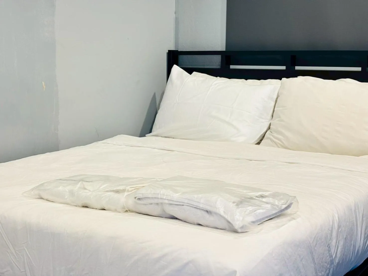 Bed in Sukhum Huai Khwang Guest House