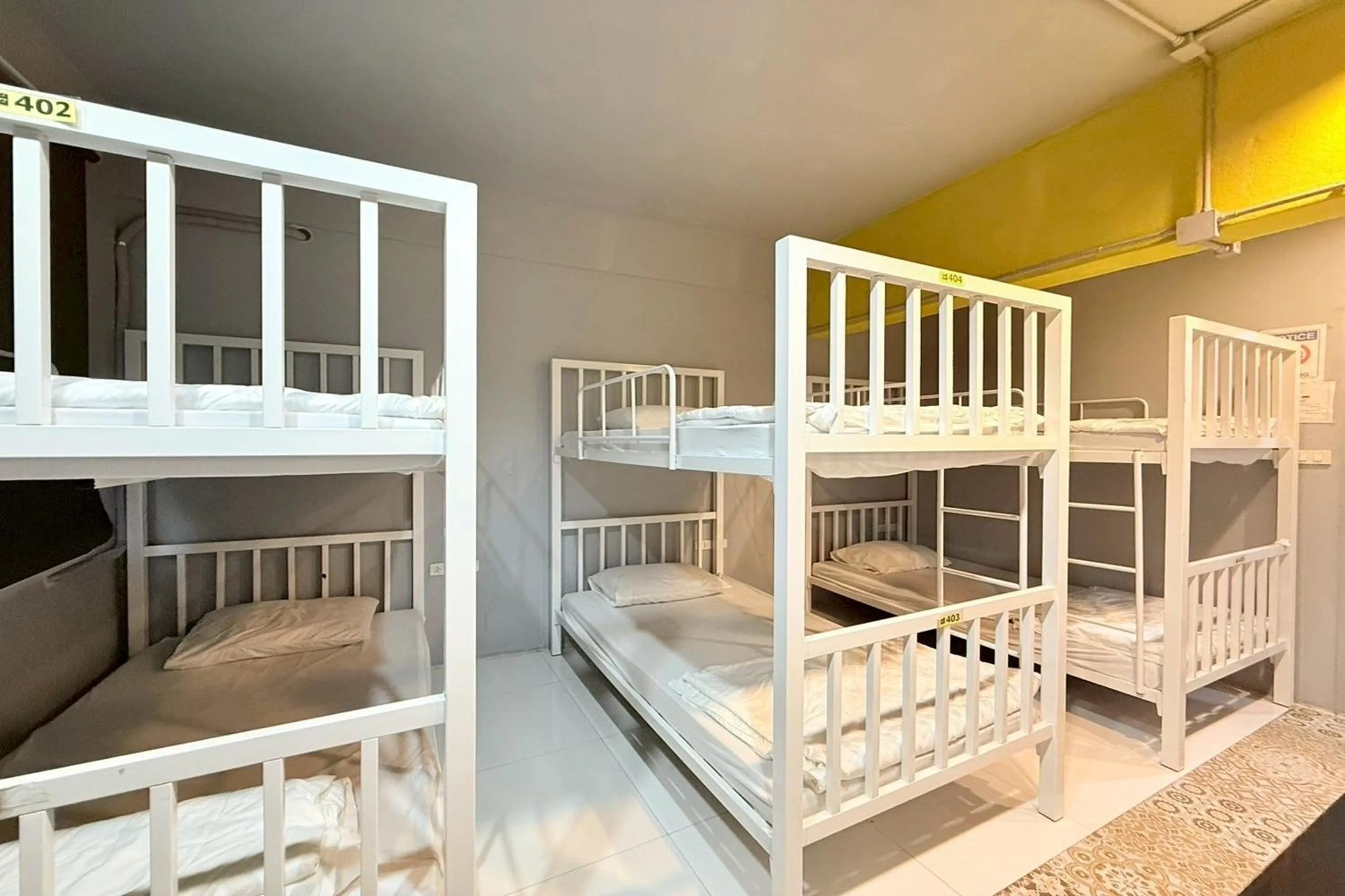 Photo of the whole room, Bed in Sukhum Huai Khwang Guest House