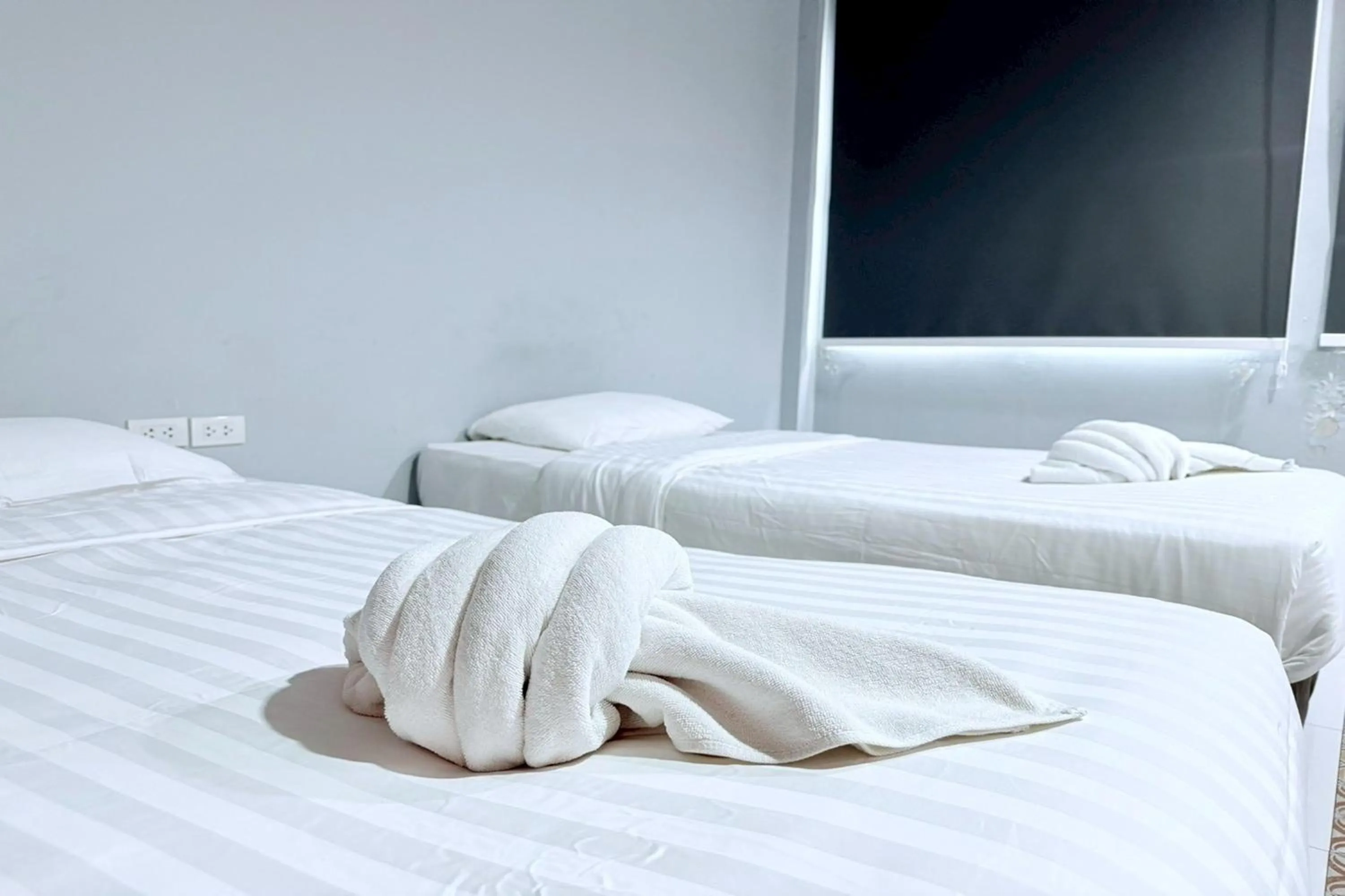 Bed in Sukhum Huai Khwang Guest House