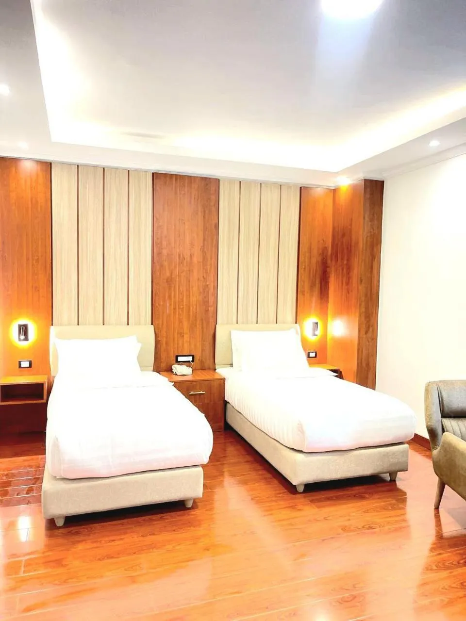 Bed in Crescent International Hotel