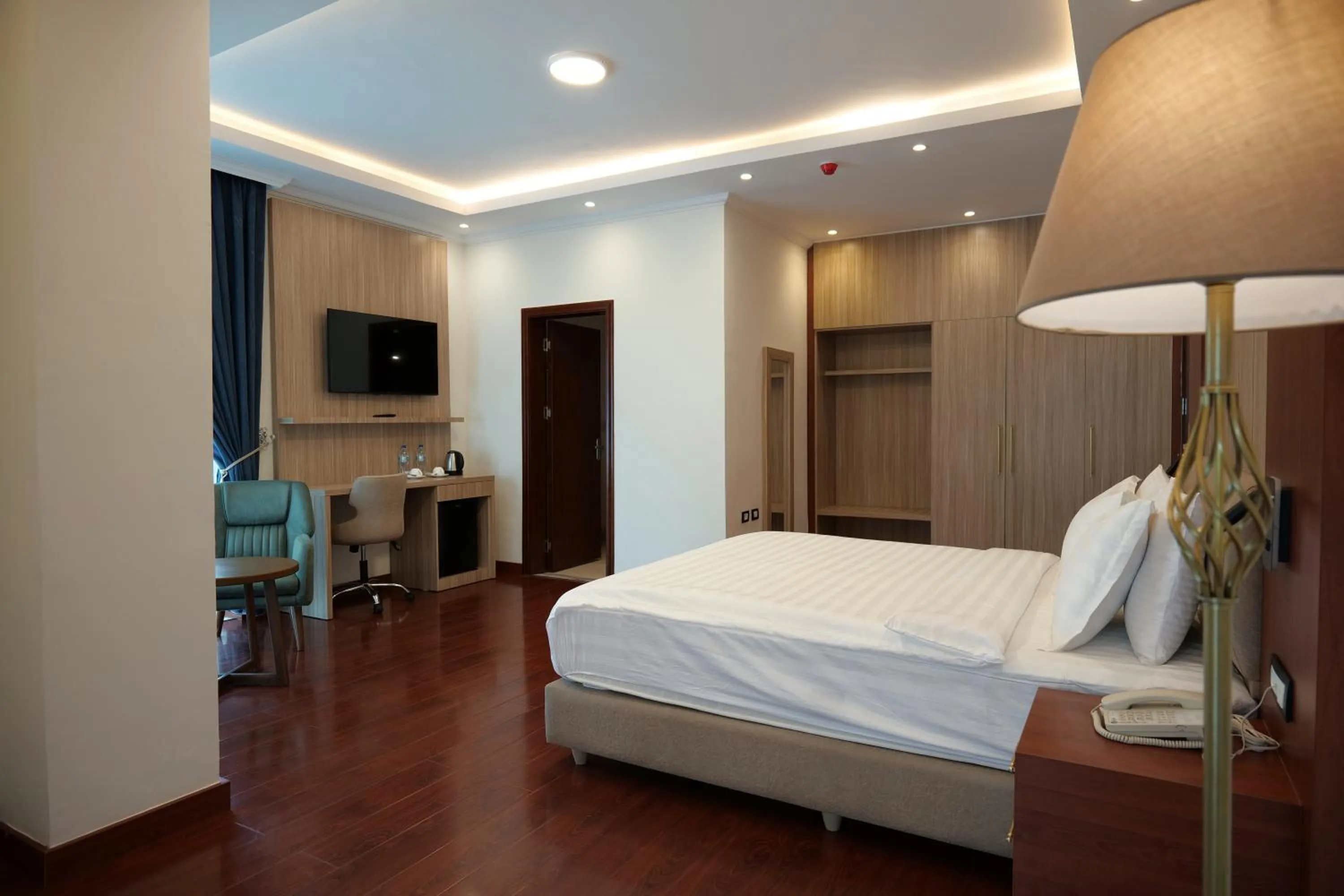 Bed in Crescent International Hotel