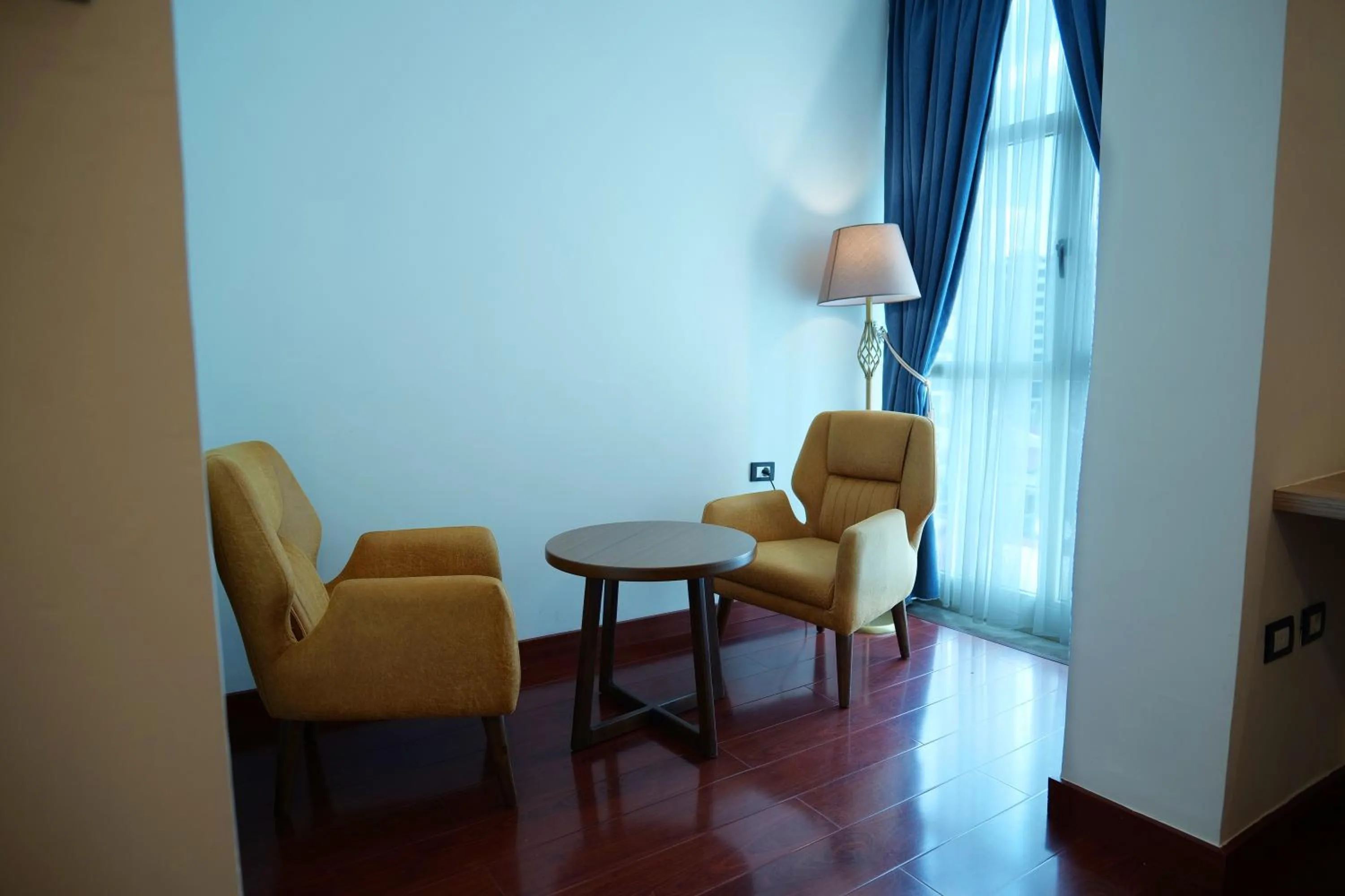 Bed in Crescent International Hotel