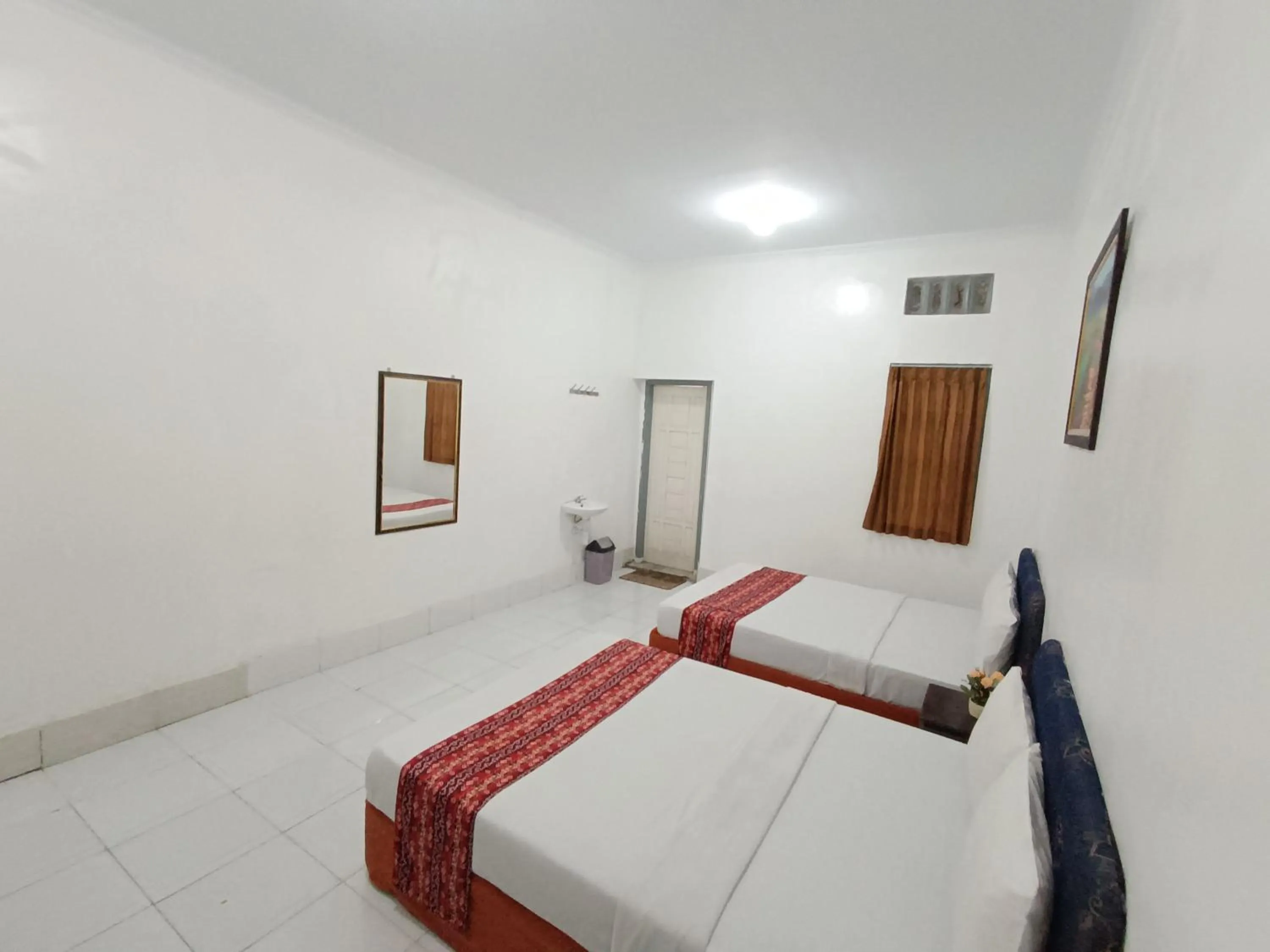 Bed in Hotel STIPRAM Kaliurang Yogyakarta