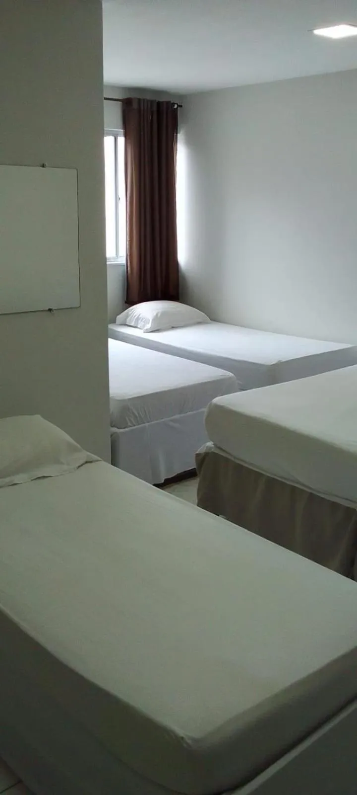 Bed in Nalu Beach Hotel pousada