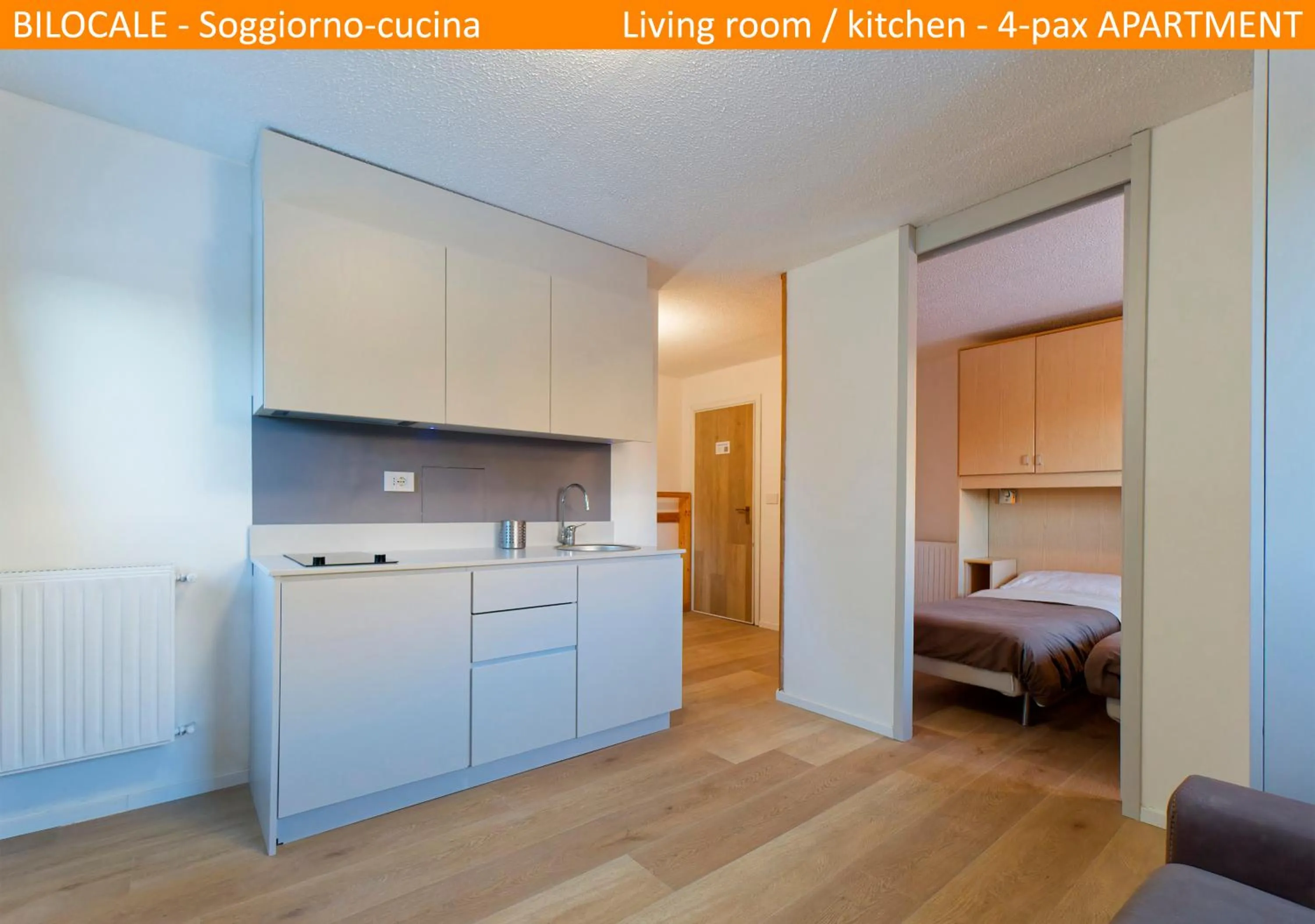 Kitchen or kitchenette, Bed in Apartment Tonale