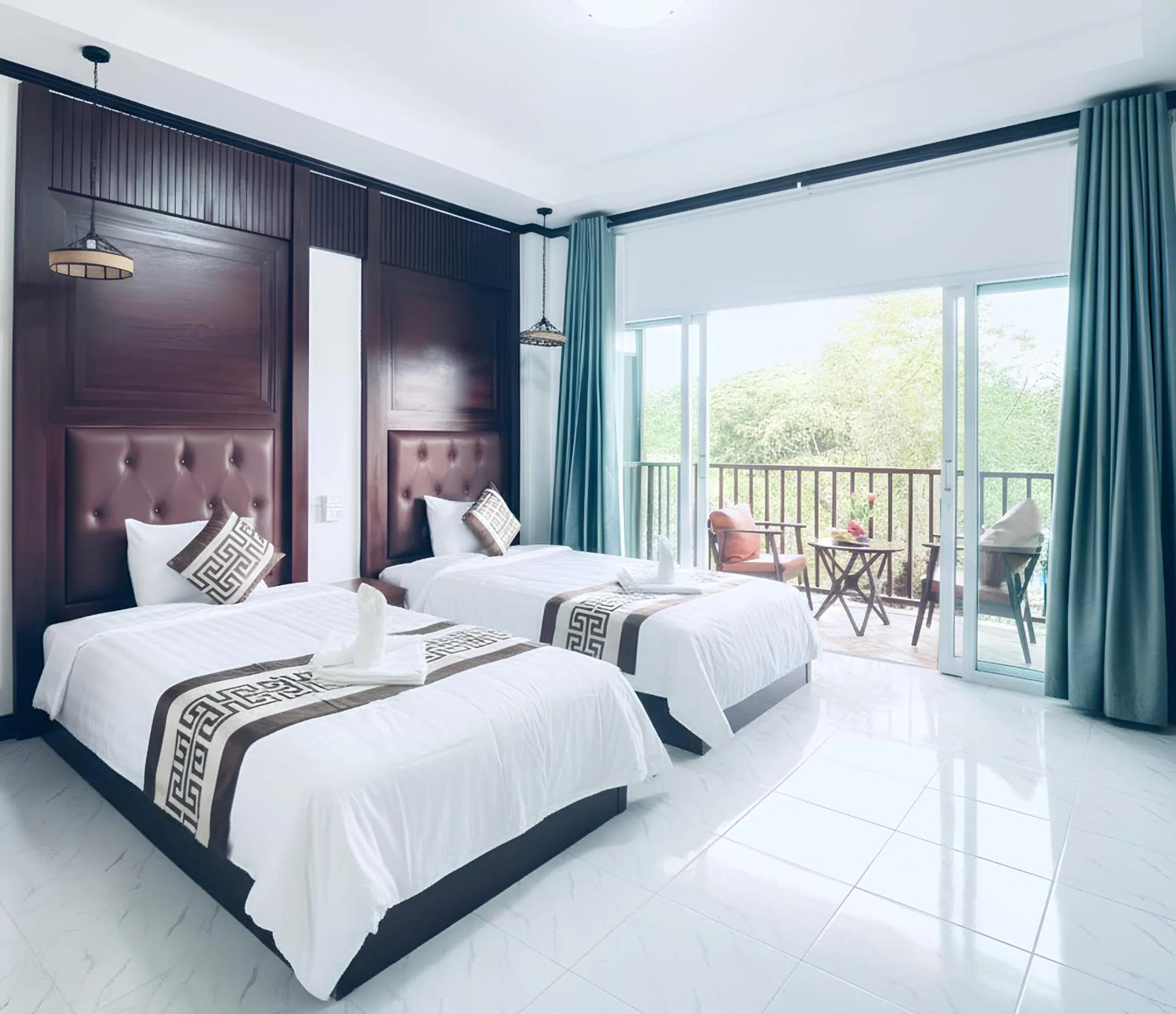 Bed in Intimate Riverside Resort Vang Vieng