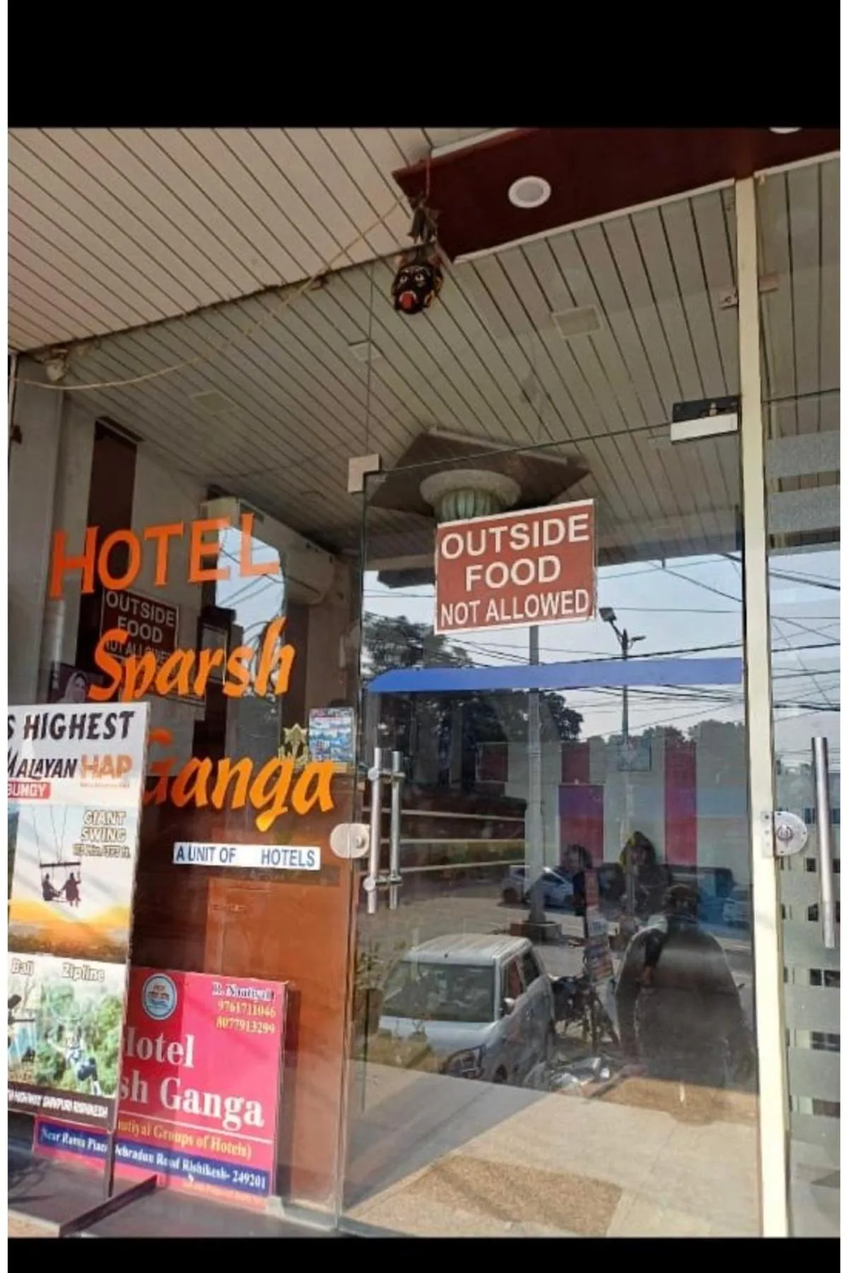 Property logo or sign in Hotel Sparsh Ganga