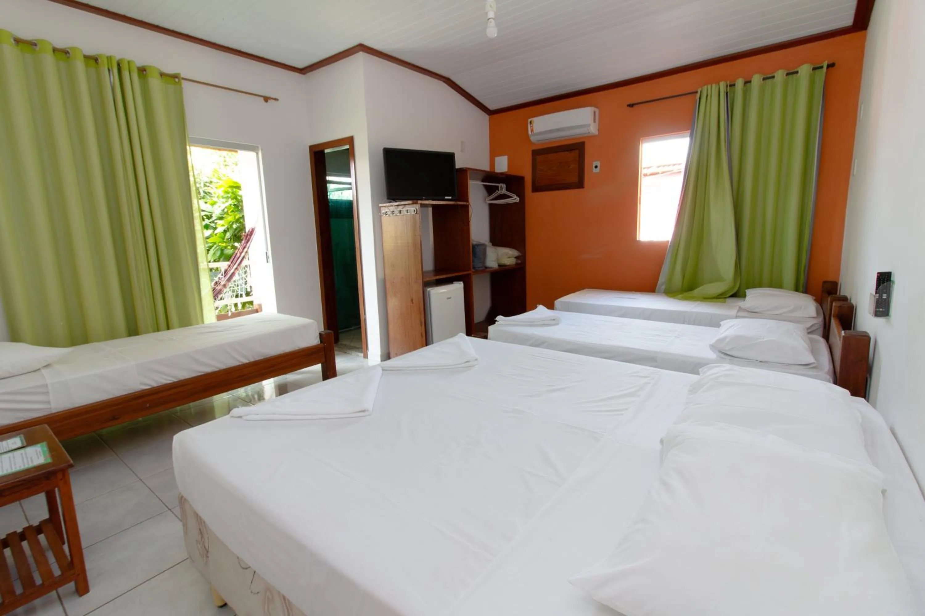 Bed in Pousada Manga Rosa- Arraial