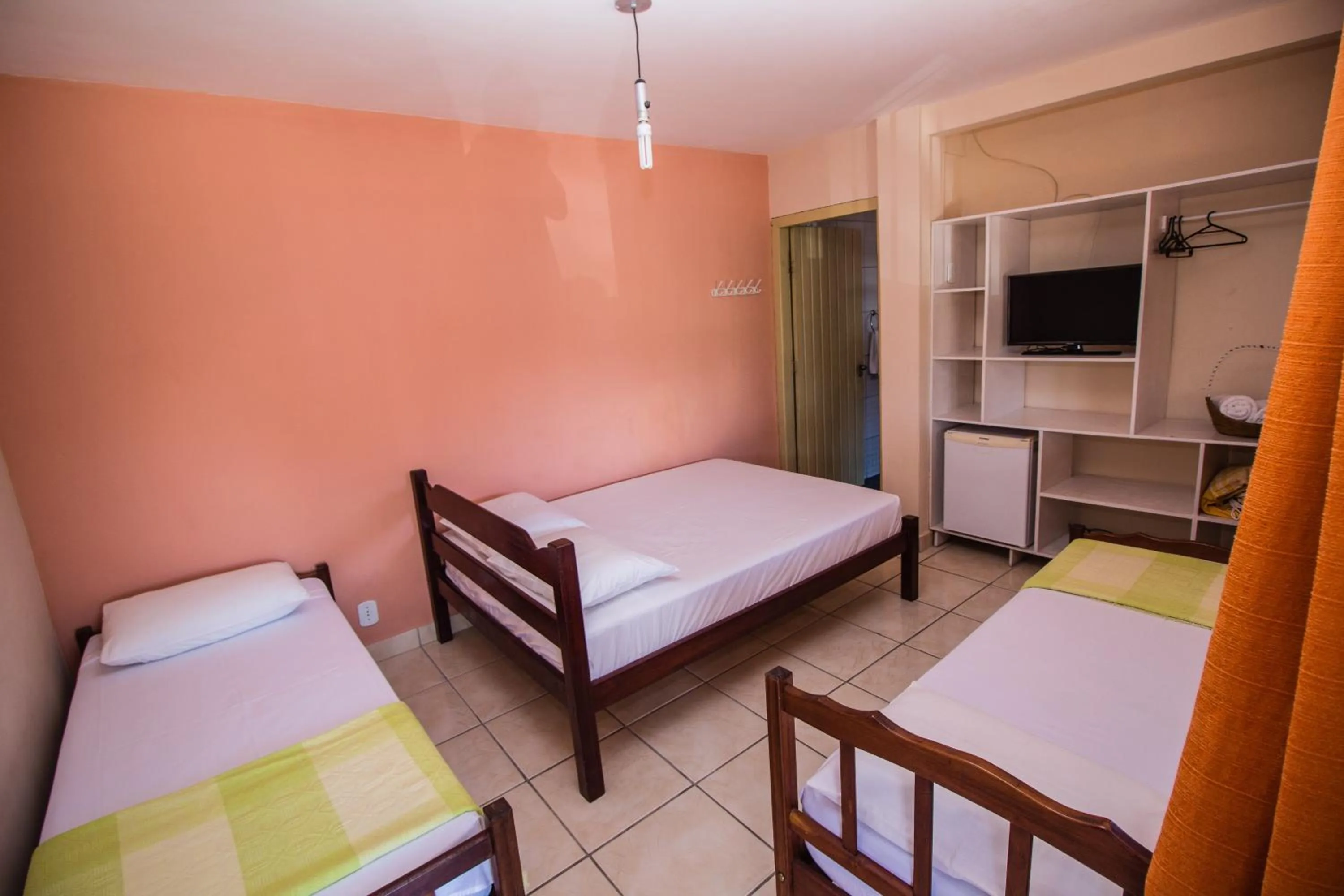 Bed in Pousada Manga Rosa- Arraial