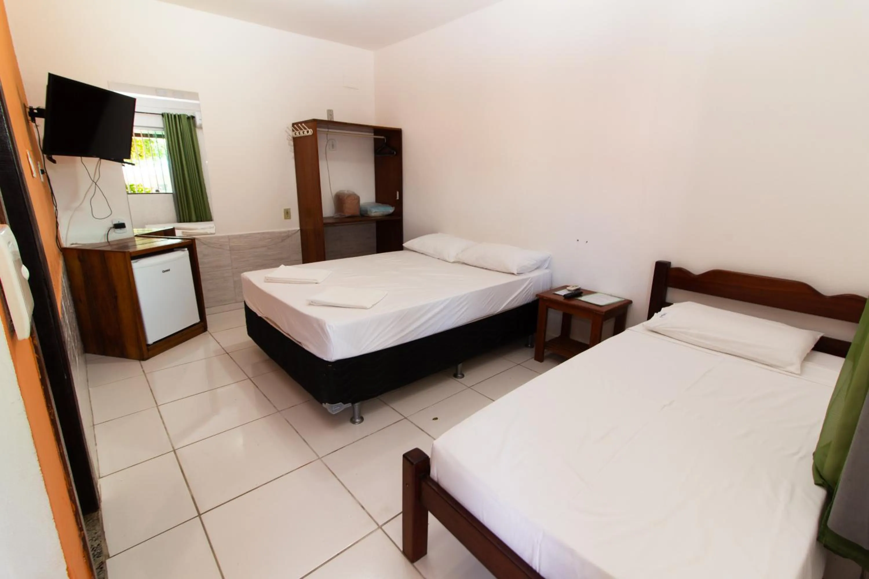 Bed in Pousada Manga Rosa- Arraial