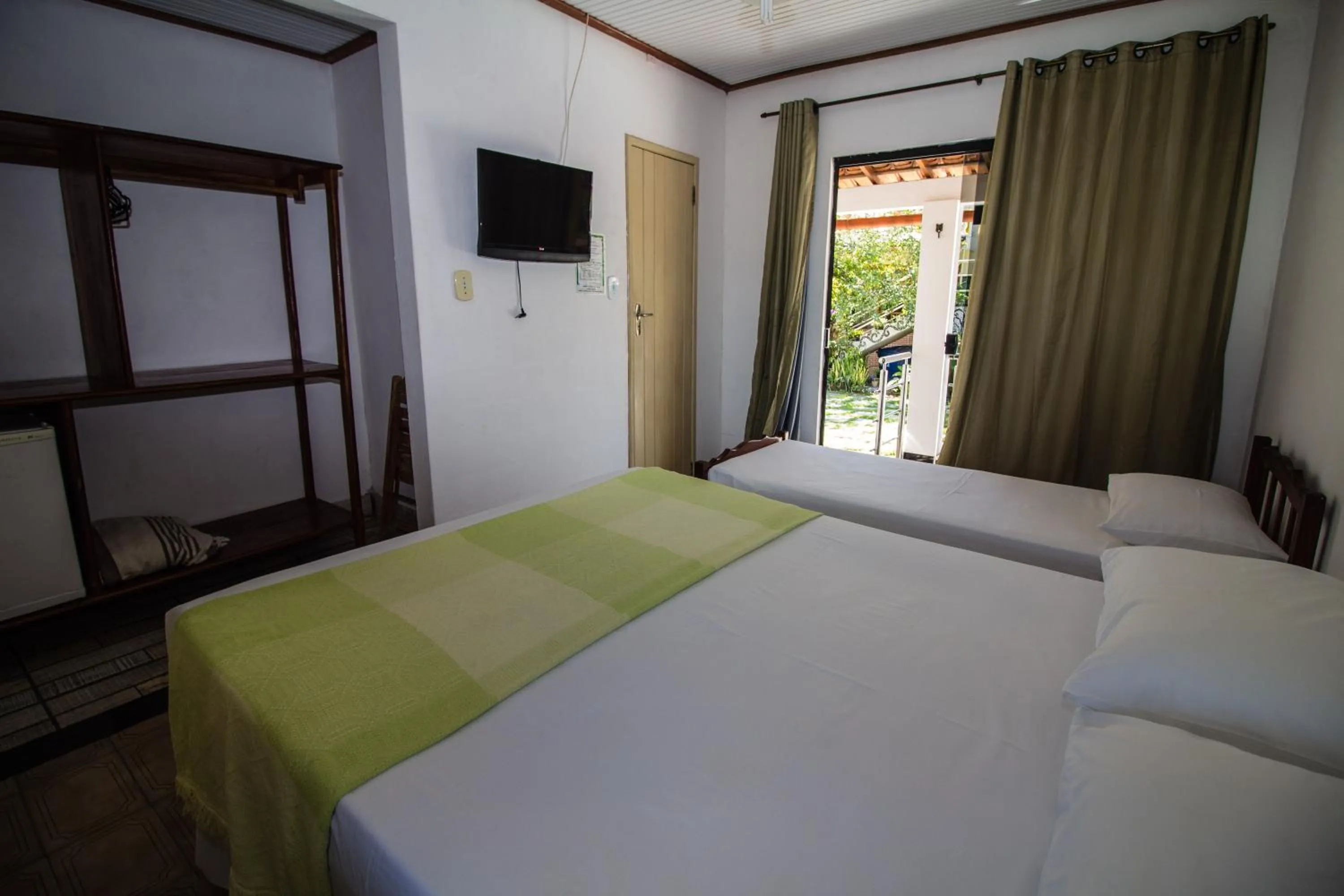 Bed in Pousada Manga Rosa- Arraial