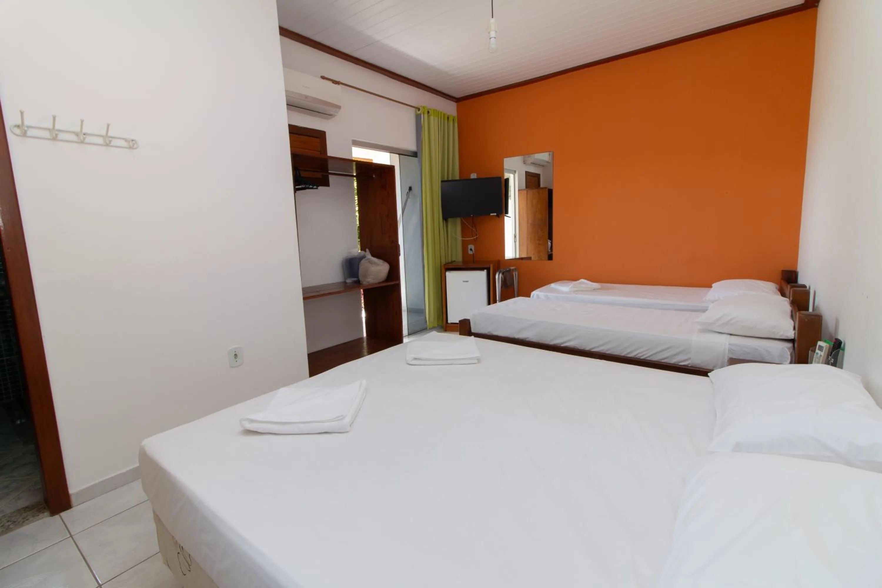 Bed in Pousada Manga Rosa- Arraial