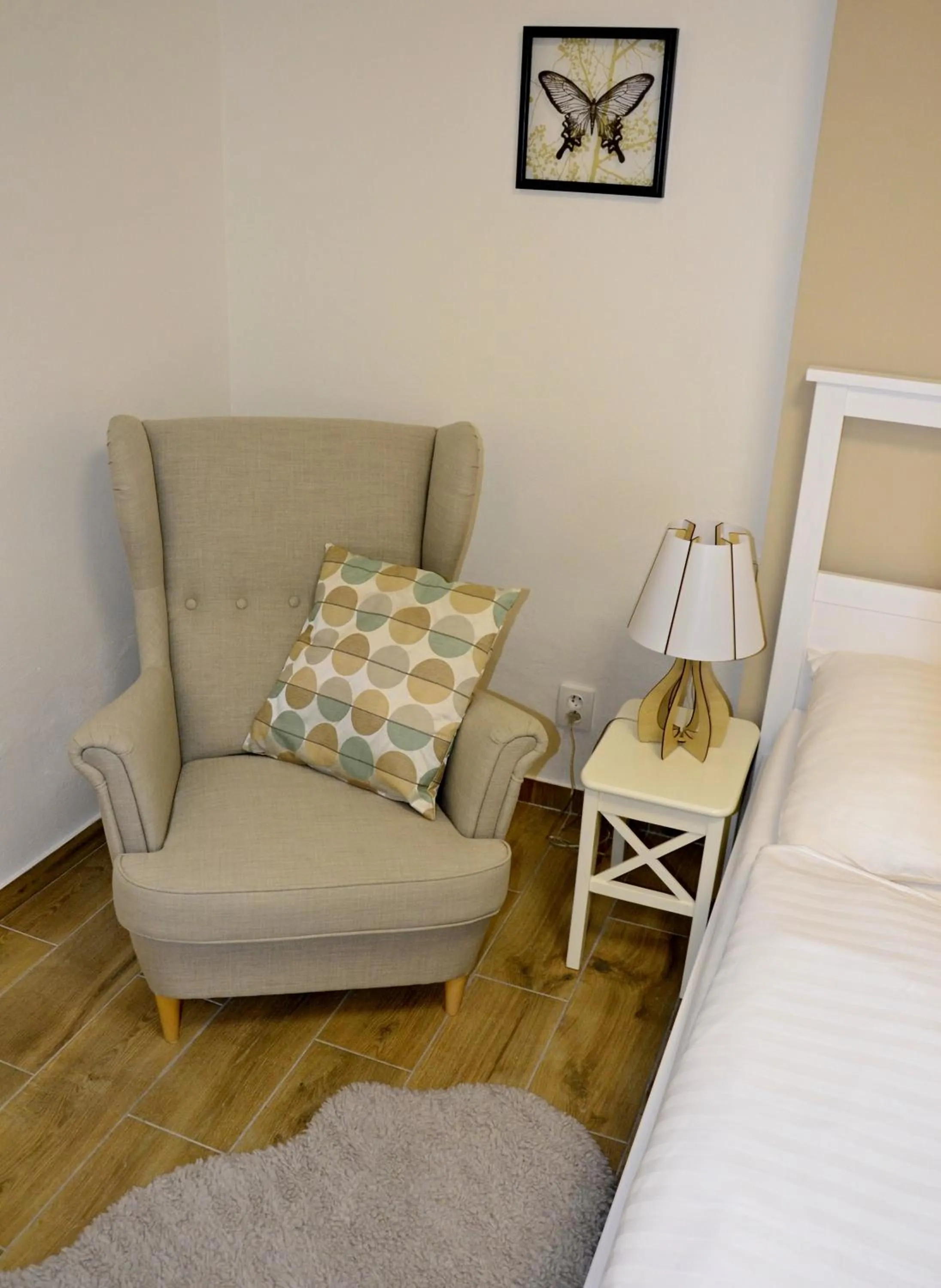 Seating area, Bed in Hotel Drnholec