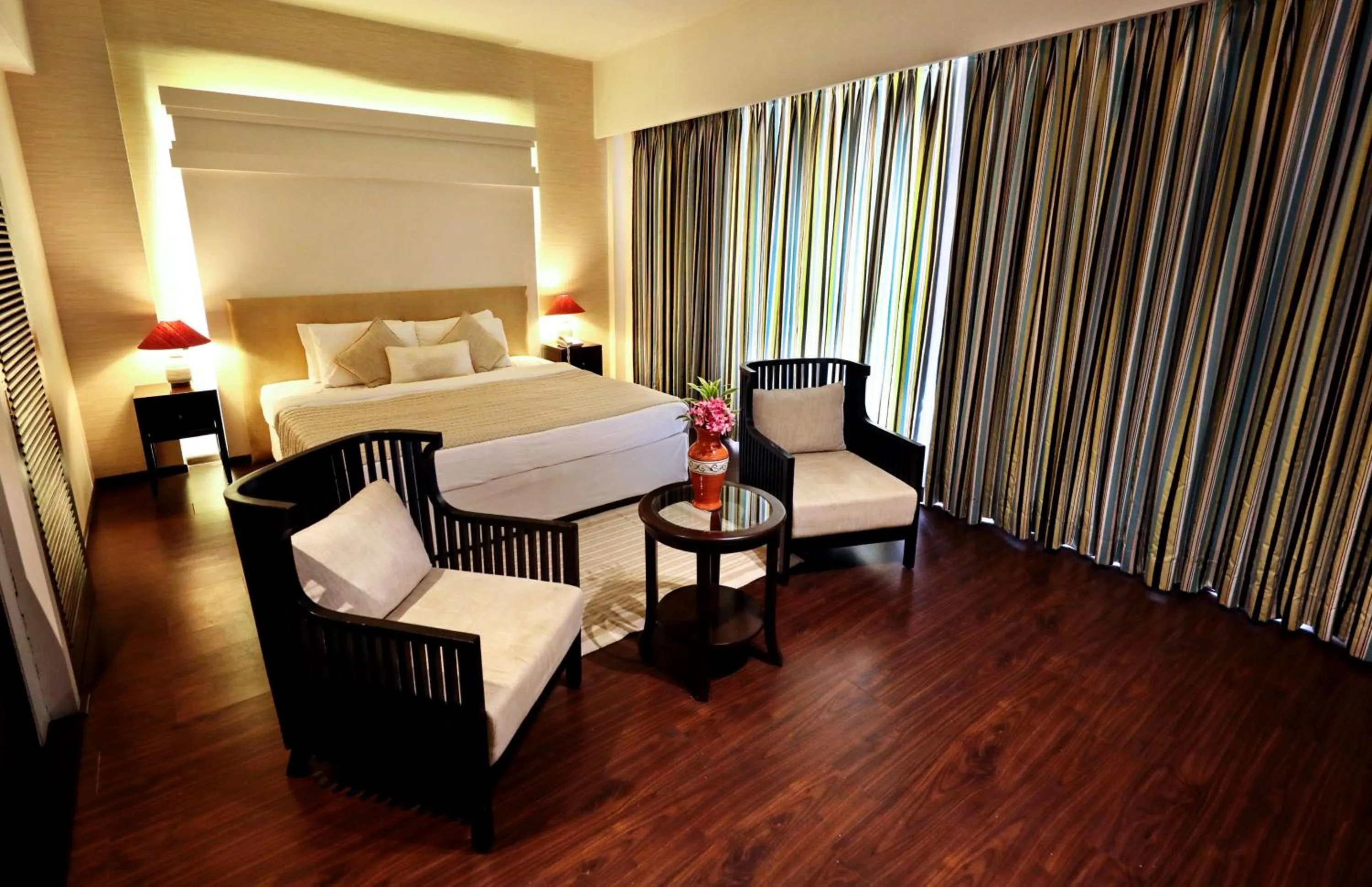 Photo of the whole room, Bed in Blue Ocean The Fern Resort & Spa Ganpatipule