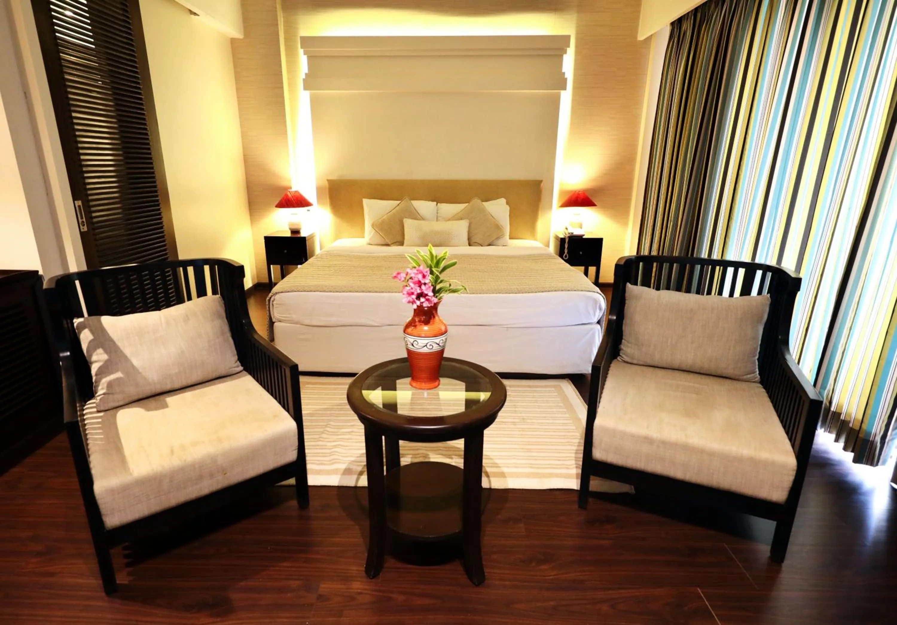 Photo of the whole room, Bed in Blue Ocean The Fern Resort & Spa Ganpatipule