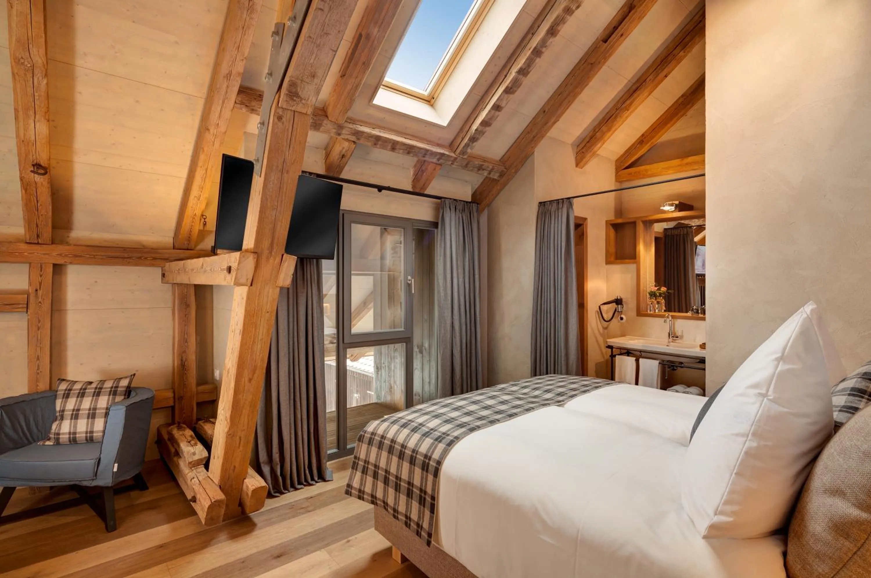 Photo of the whole room, Bed in AlmRefugio