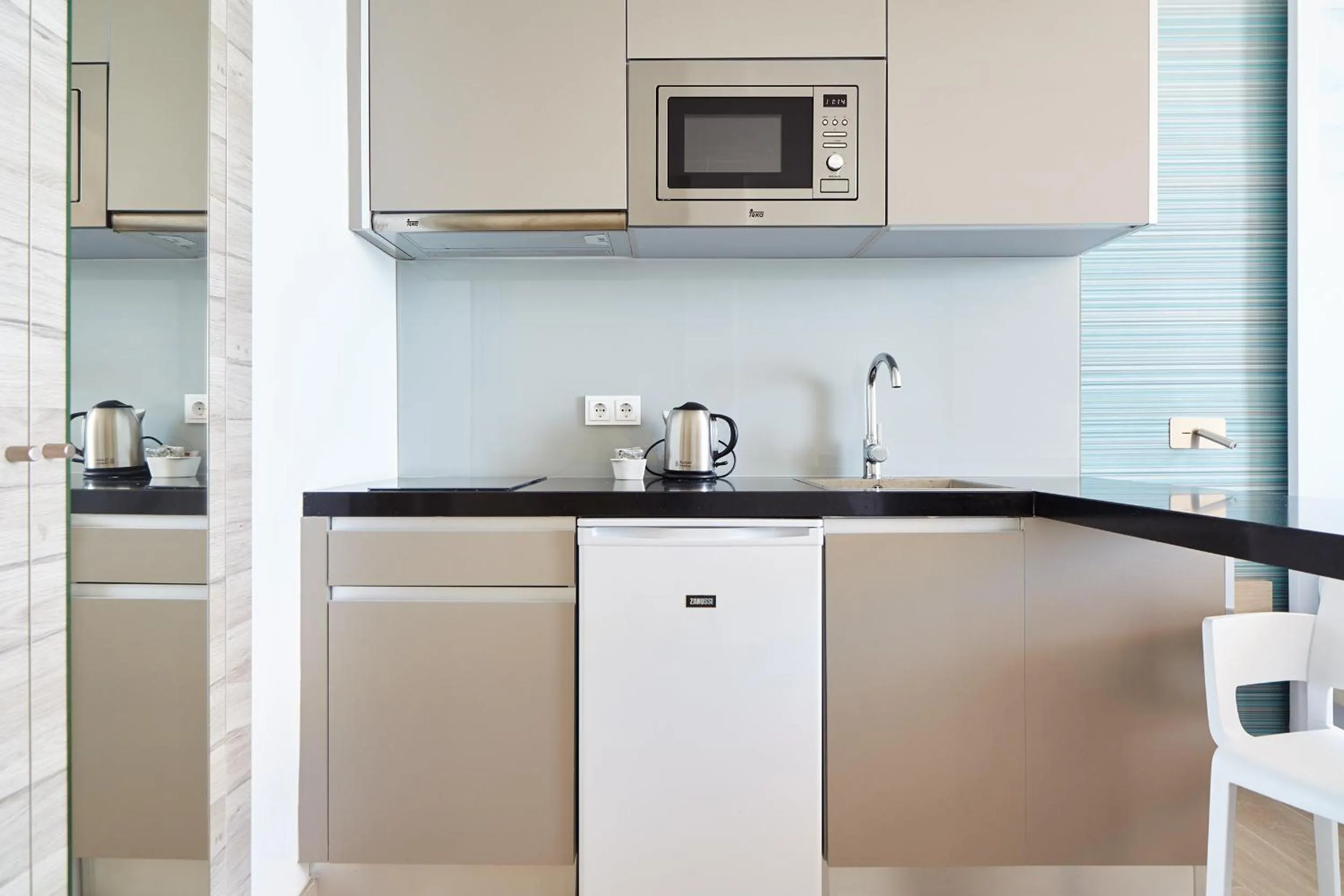 Kitchen or kitchenette in Sol Bahía Ibiza Suites