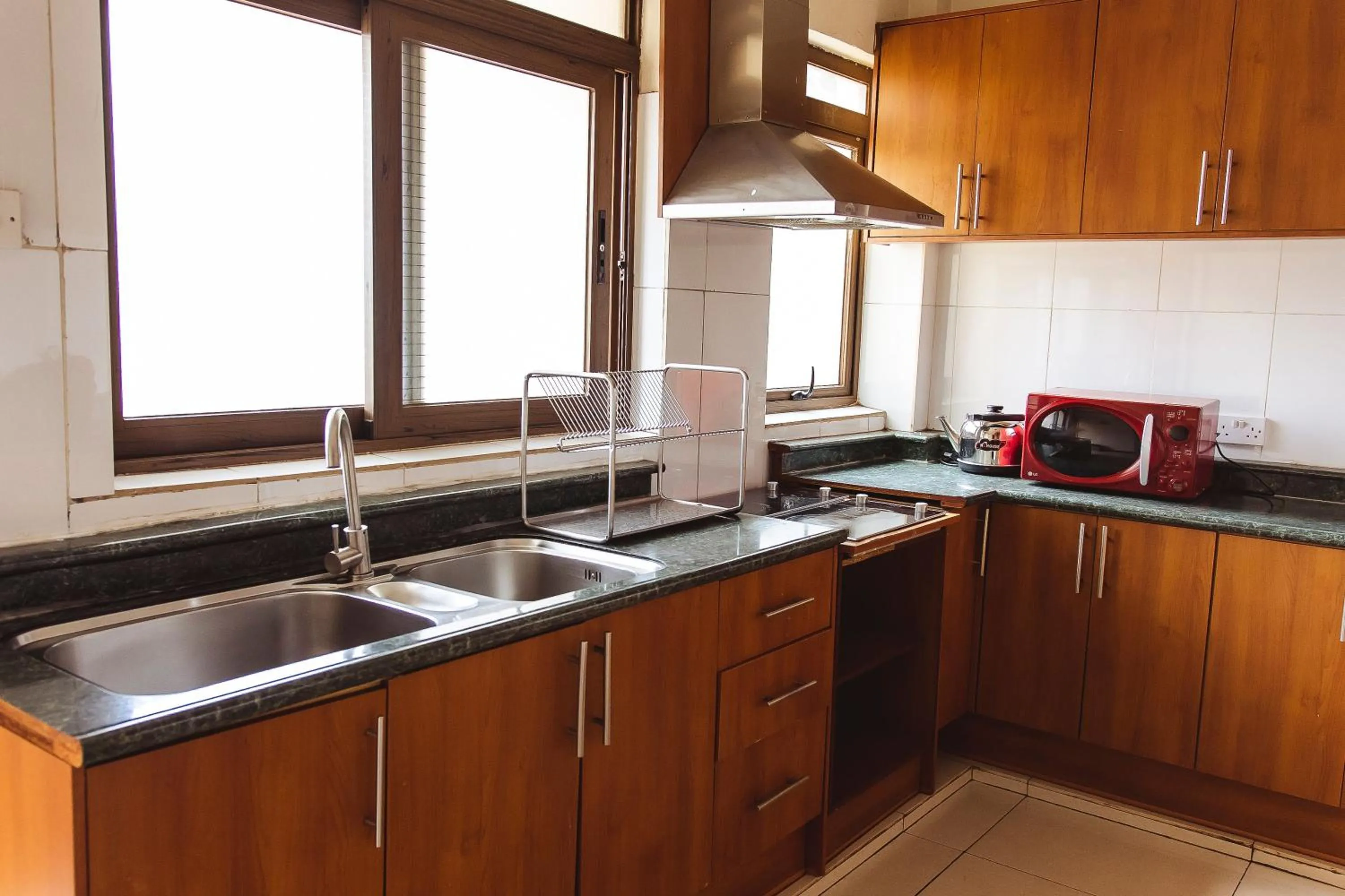 Kitchen or kitchenette in Highlands Apartment