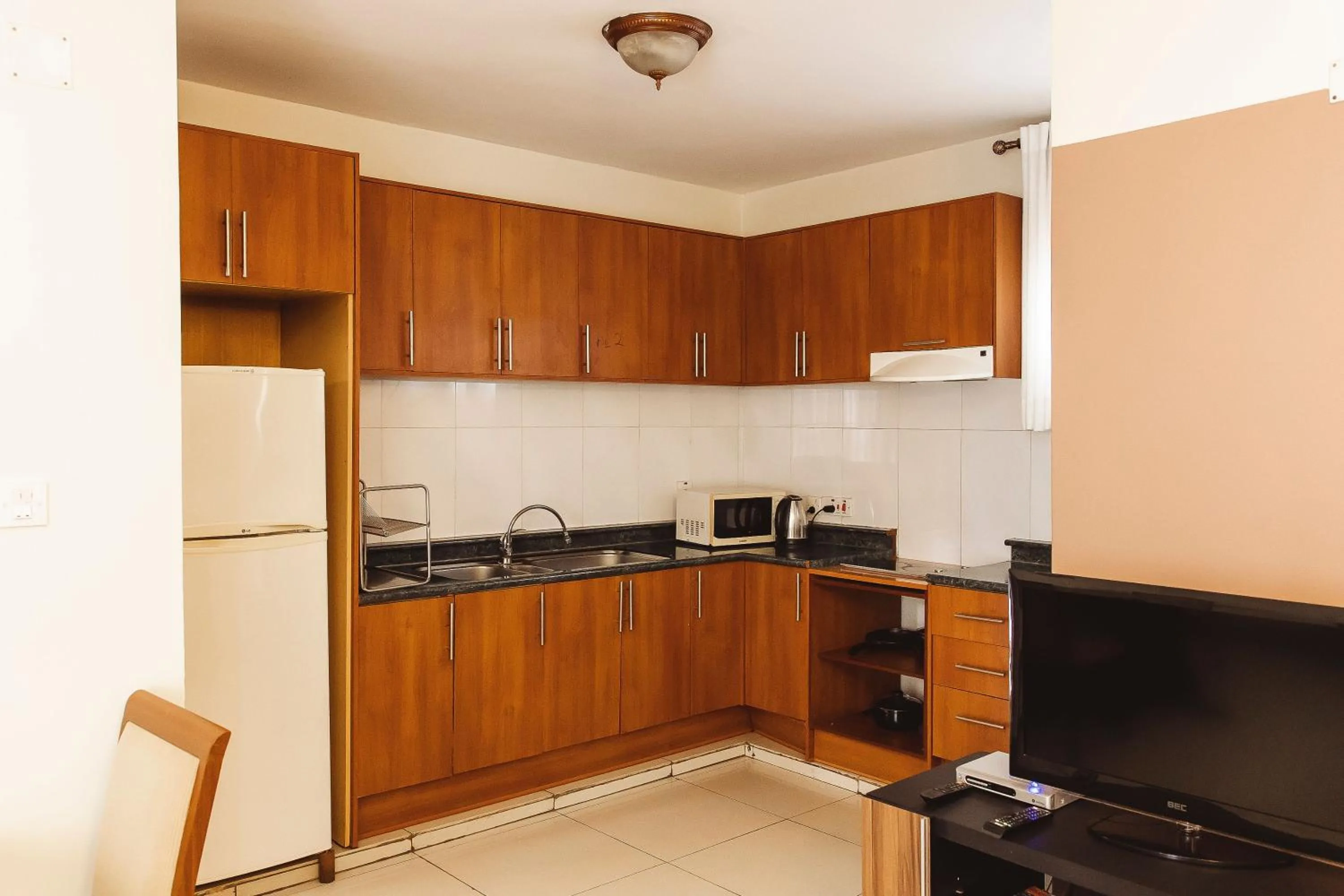 Kitchen or kitchenette in Highlands Apartment
