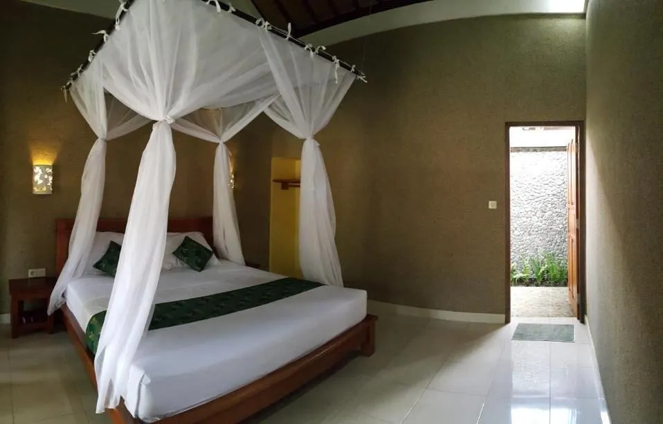 Bed in Mango Tree Inn