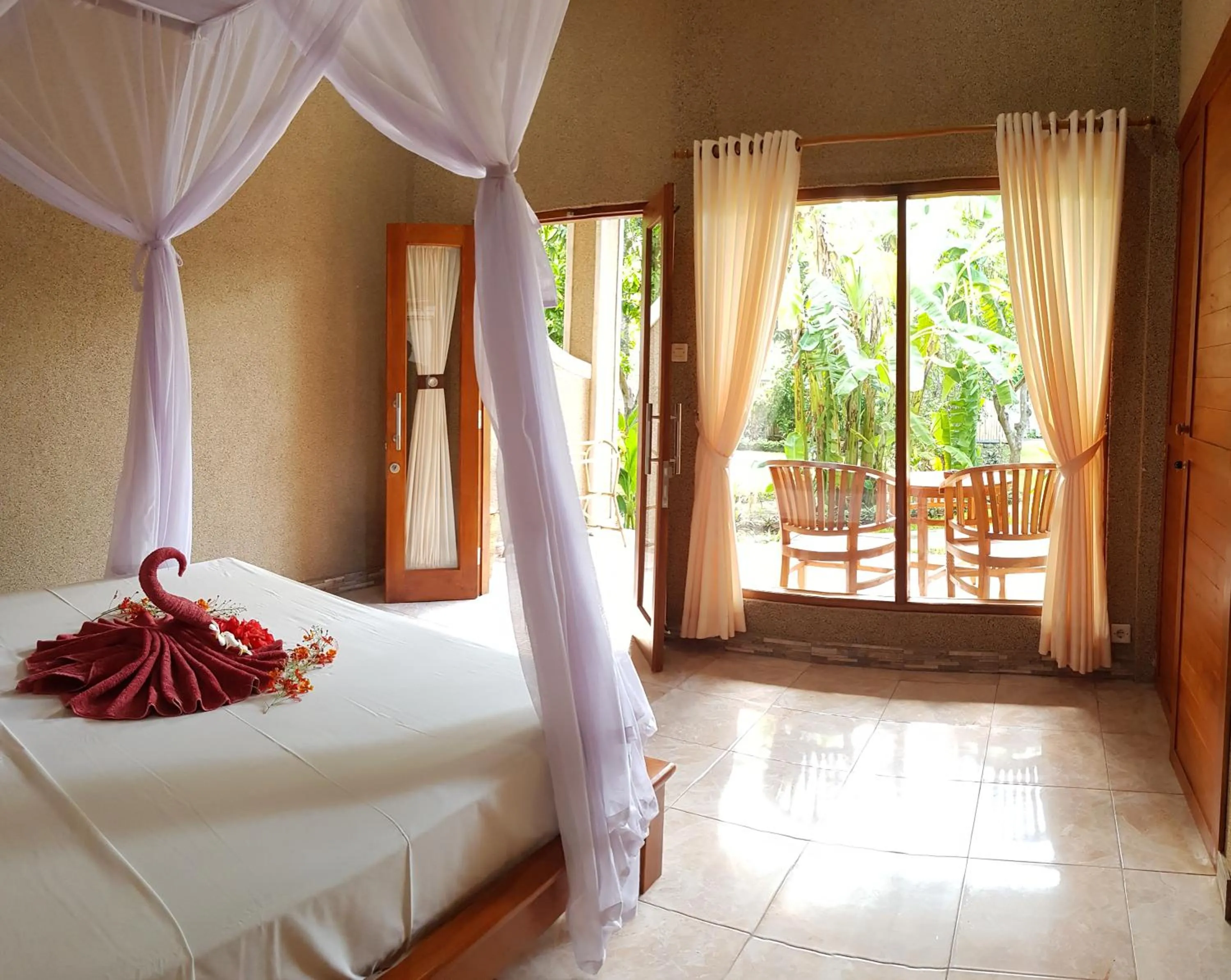 Bed in Mango Tree Inn